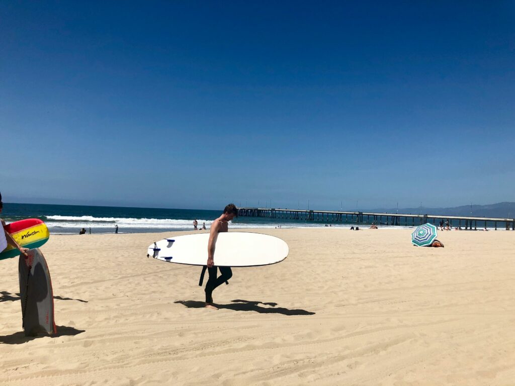 beach in algarve, surfer