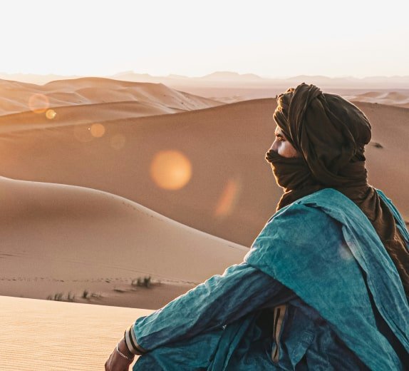 Man sitting in desert