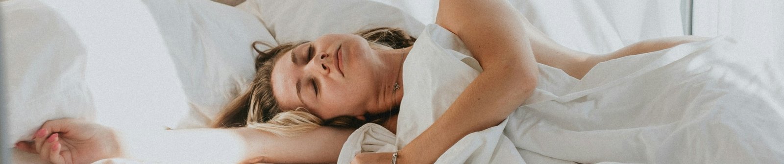 Women relaxing in bed