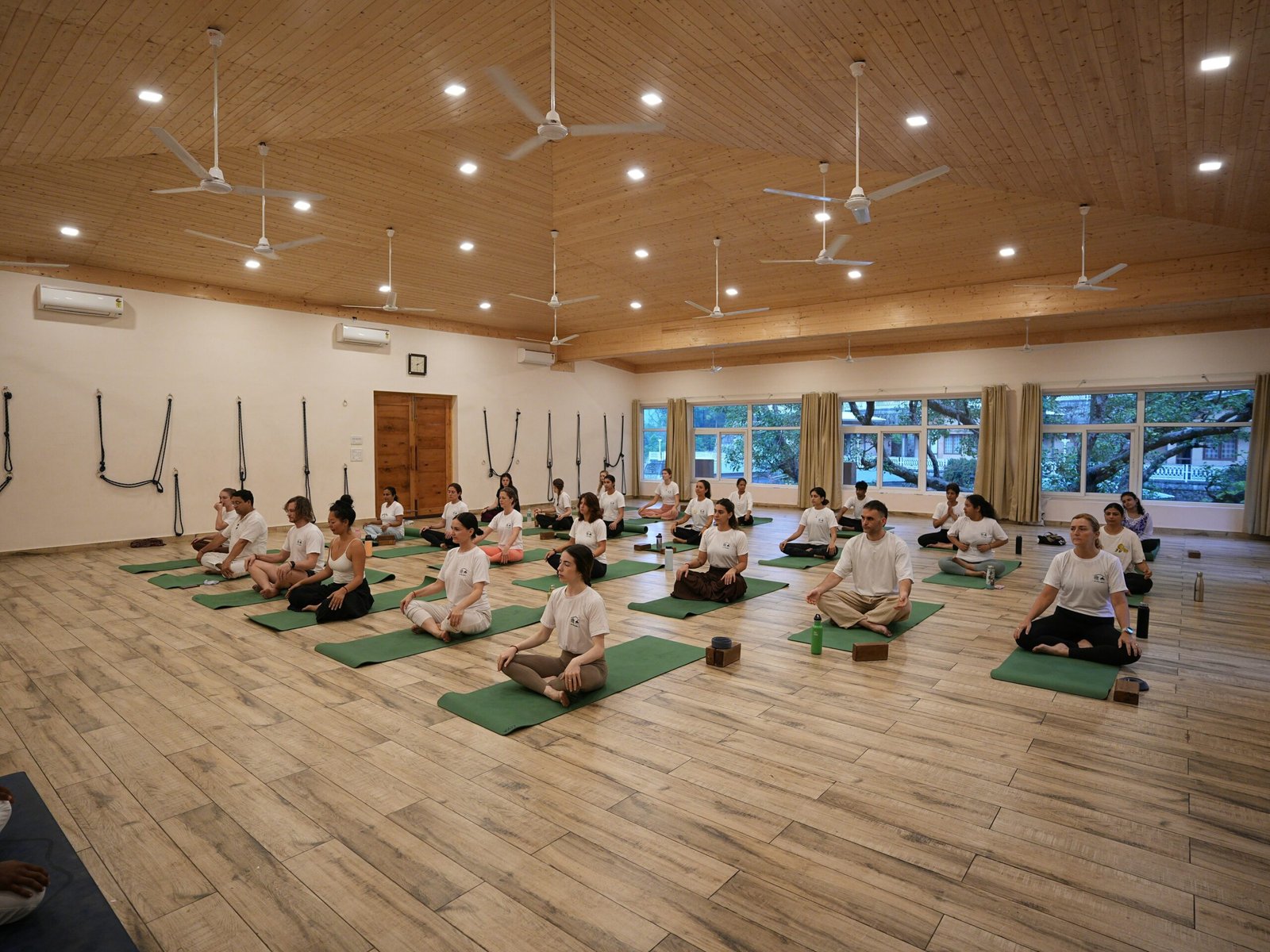 Group meditation session in Rishikesh, India reflecting the calm and grounding side of an Ayurvedic retreat