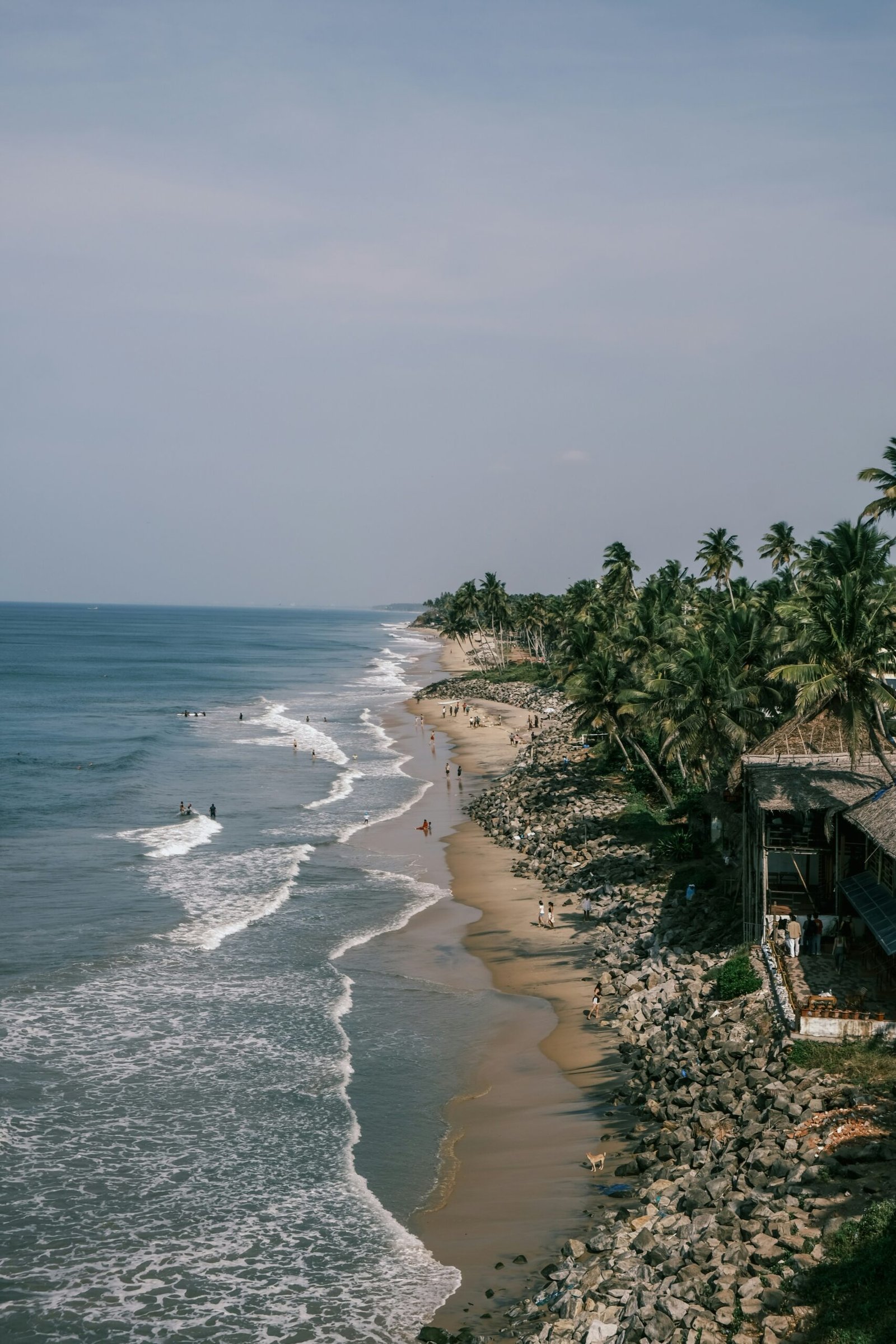 Palm-fringed beach view in Varkala, Kerala, bringing a calm seaside atmosphere to an Ayurveda retreat article for India.