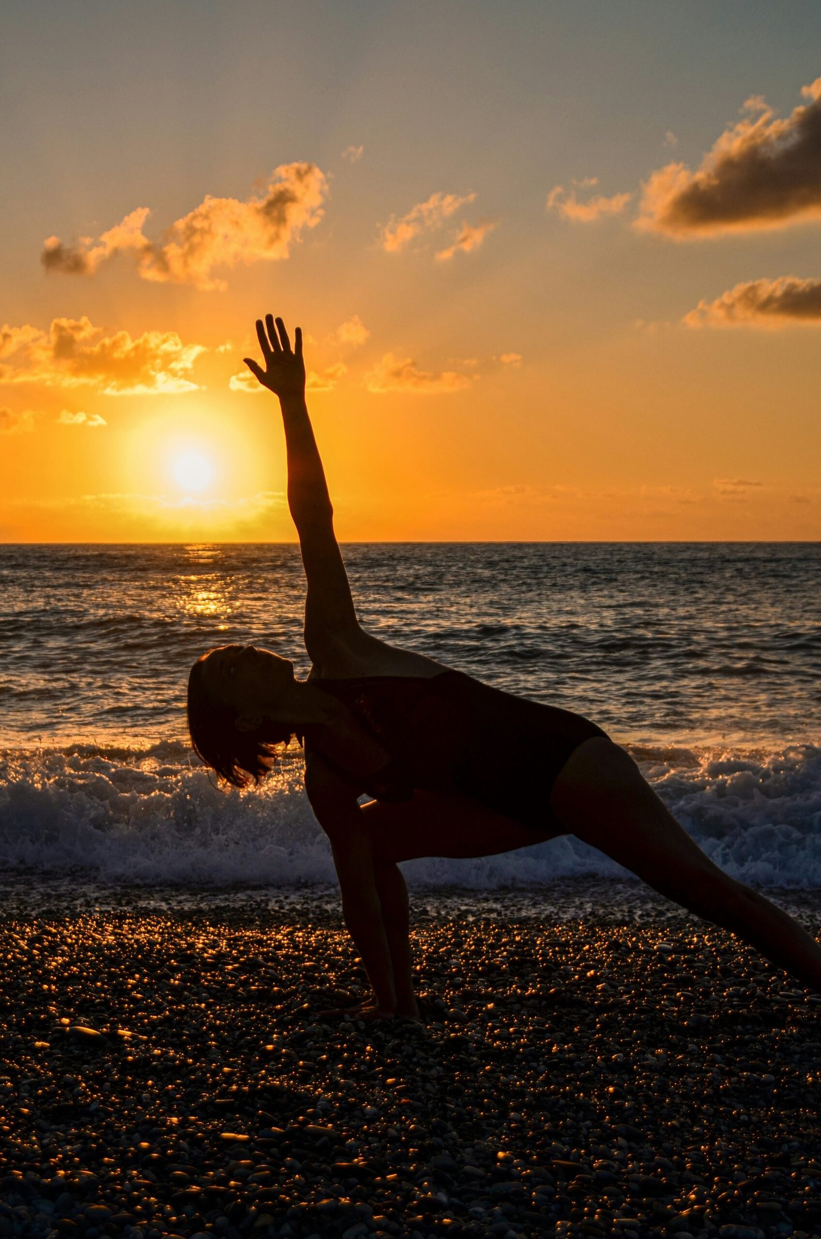 woman practicing yoga at sunrise inspired by the calm and balance of italy
