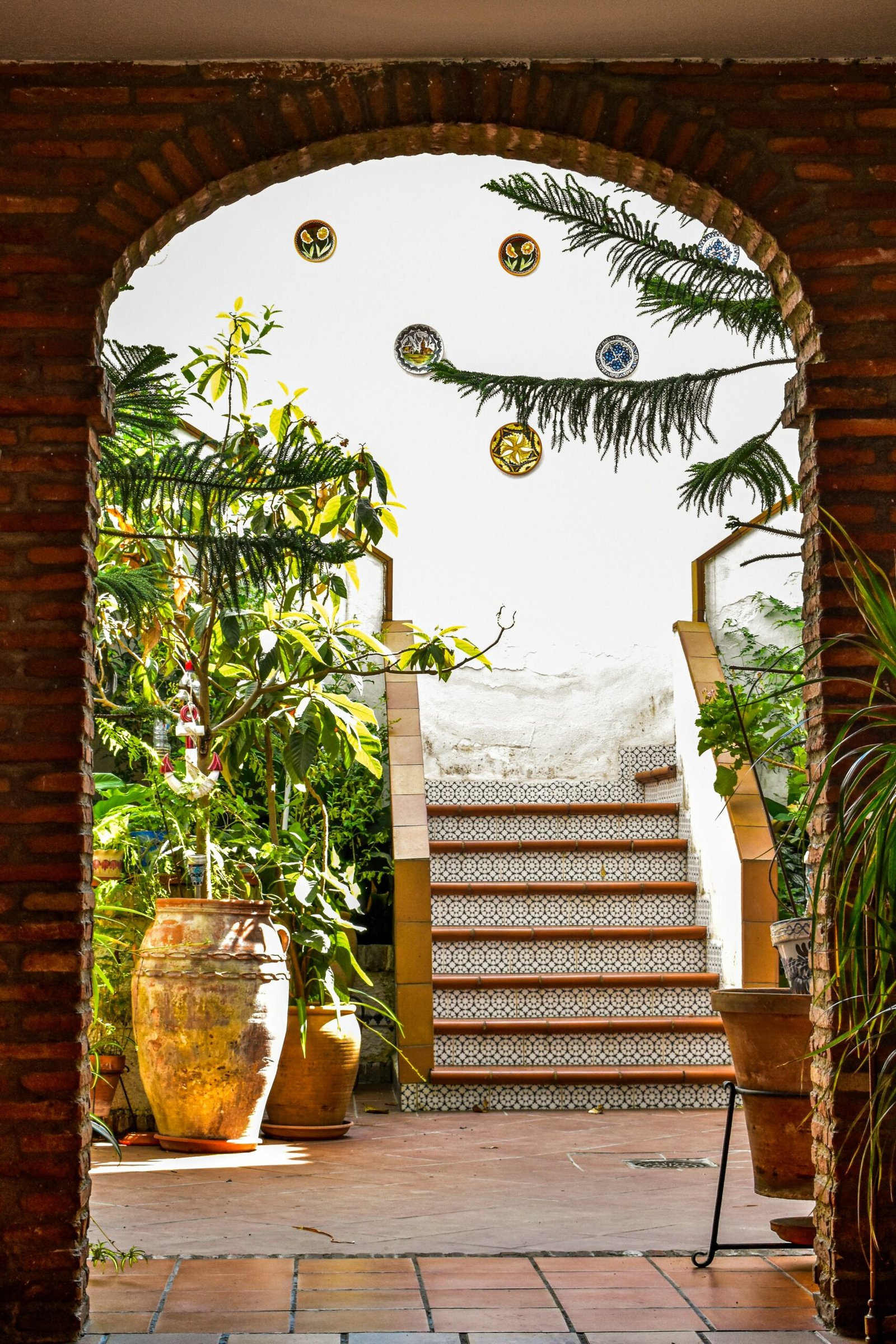 Traditional patio in Córdoba, Spain, with potted plants and a peaceful Andalusian atmosphere
