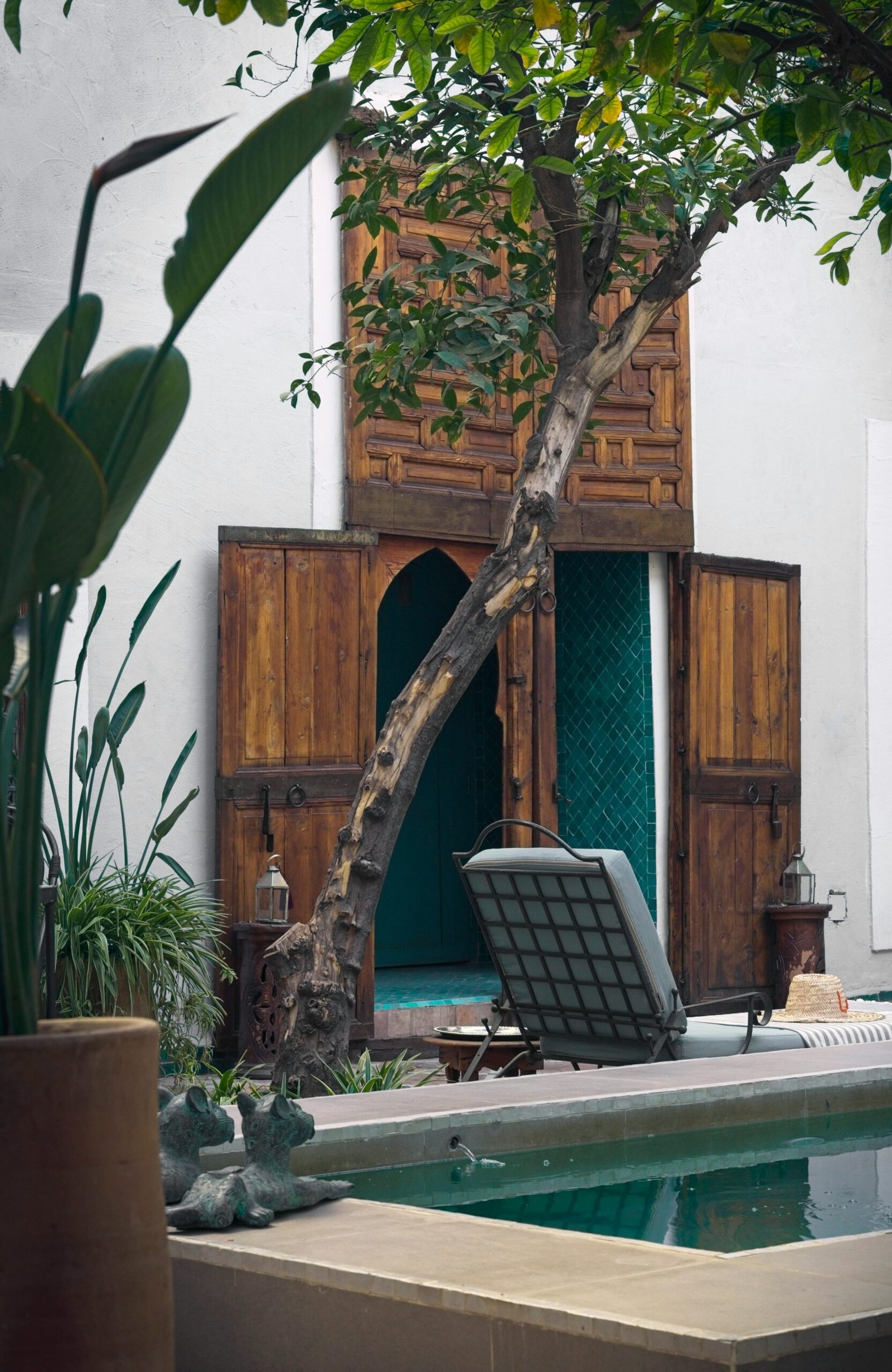 traditional marrakech riad courtyard with pool for a restorative wellness stay