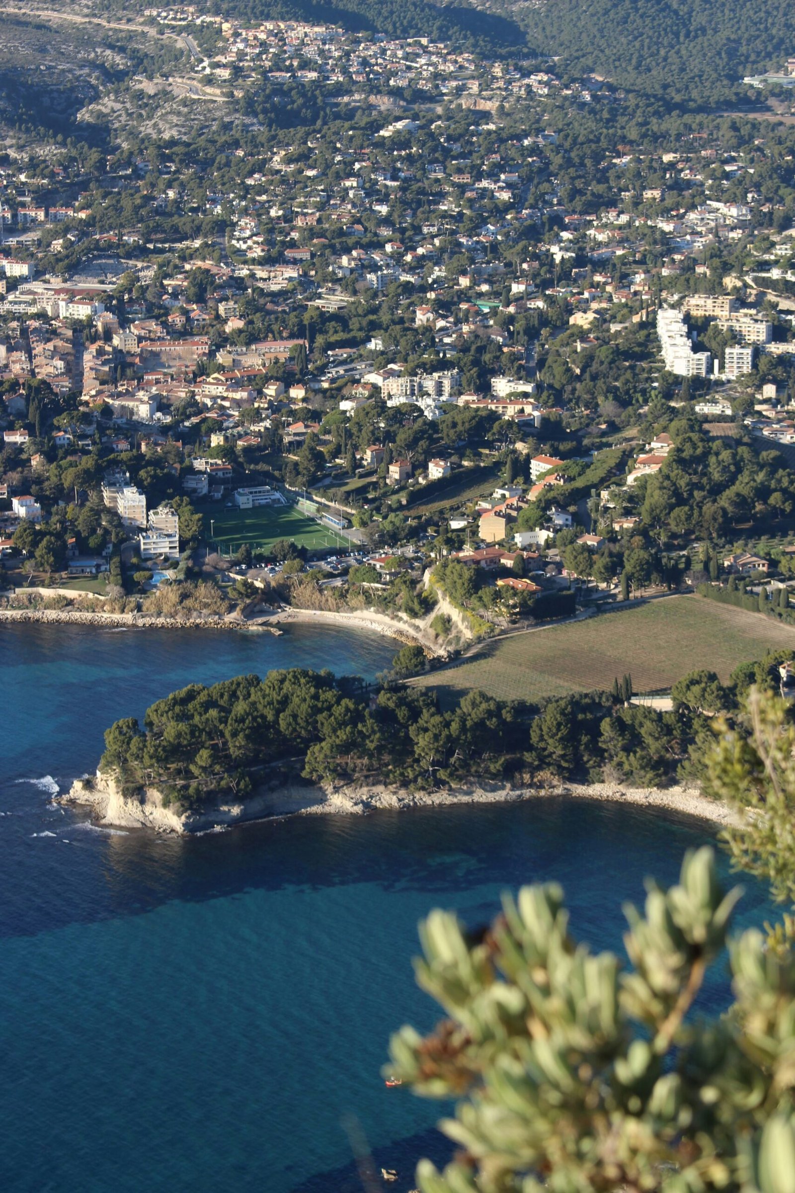 Aerial view of Cassis and the Mediterranean, ideal for a coastal France yoga retreat with fresh June energy.