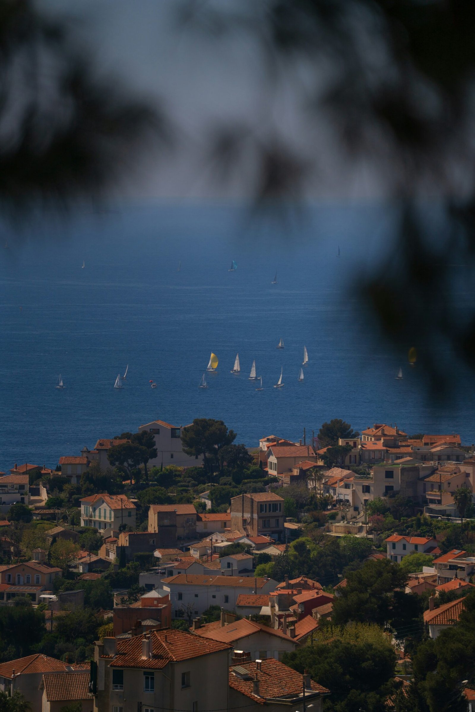 Sailboats and coastal village views in Marseille, adding a breezy South of France atmosphere to a May yoga retreat.
