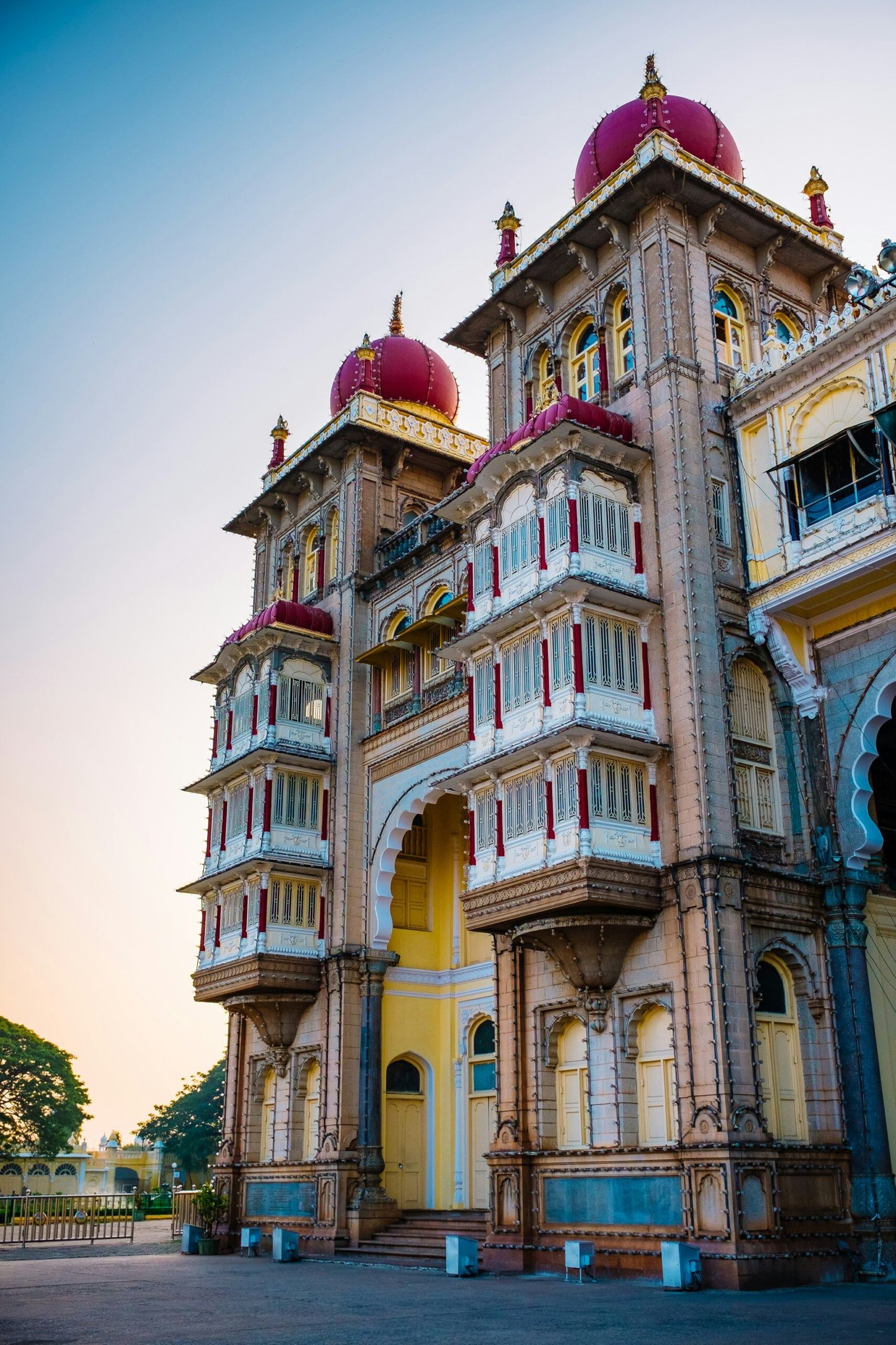 Mysore Palace in Mysuru glowing in warm light, reflecting the cultural richness and spiritual depth of an India retreat journey.