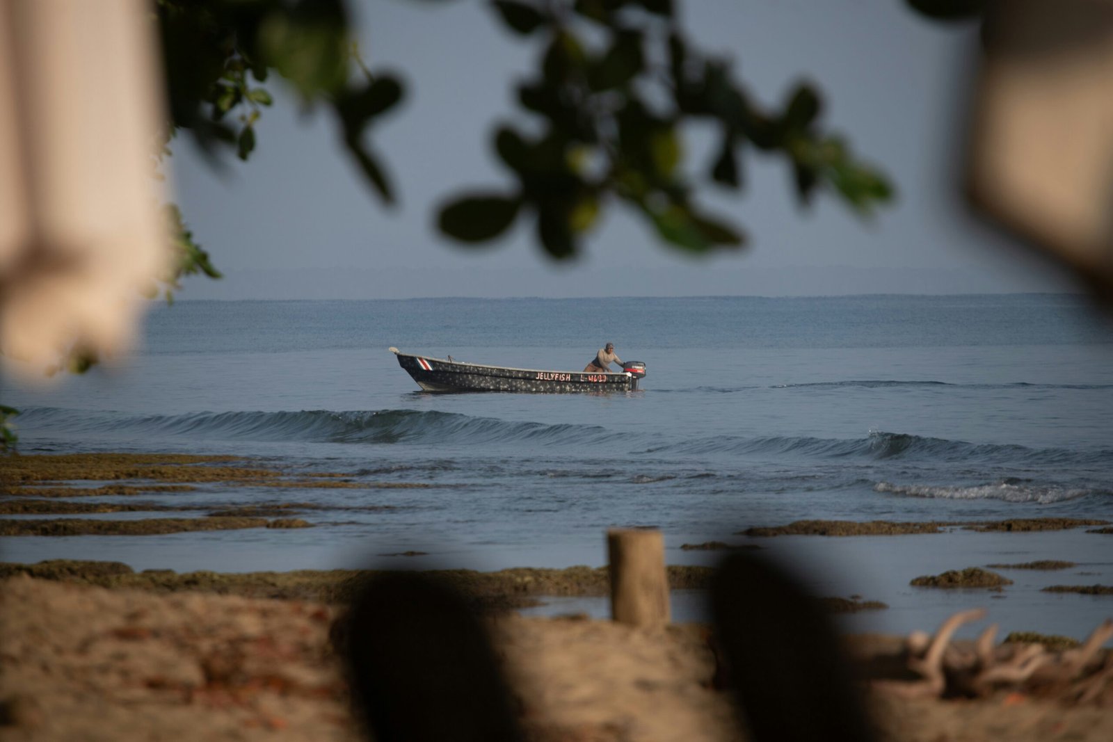Small fishing boat off the coast of Cahuita in Limón Province, Costa Rica.