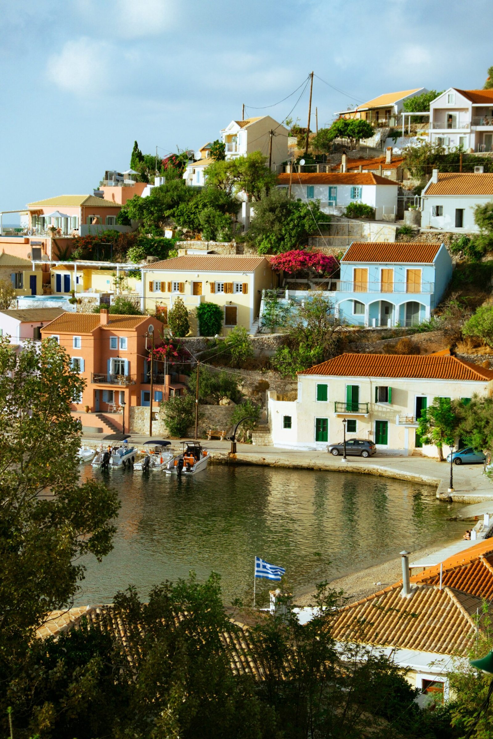 Hillside village in Assos, Kefalonia, overlooking the water and bringing a peaceful island atmosphere to a Greek retreat stay.