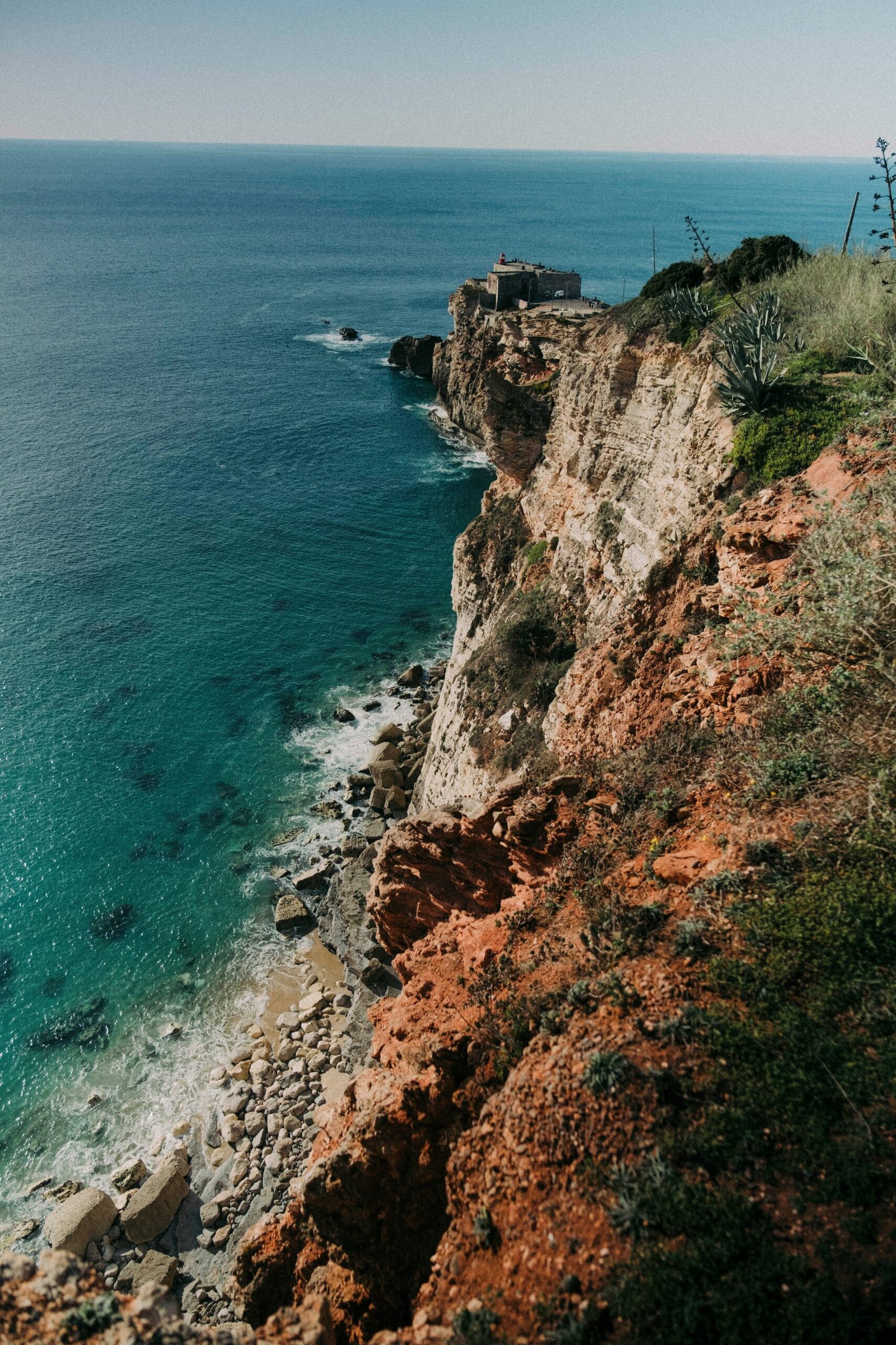 camilo beach in algarve portugal during a peaceful september yoga retreat