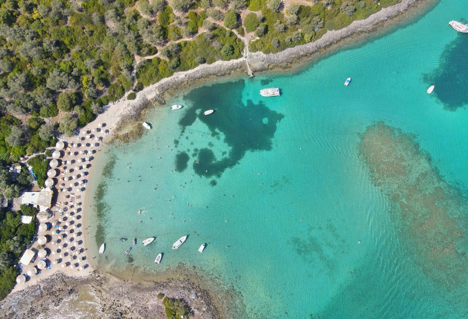 Aerial view of Lichadonisia in Evia with vivid blue water, fitting an island-based April retreat in Greece.