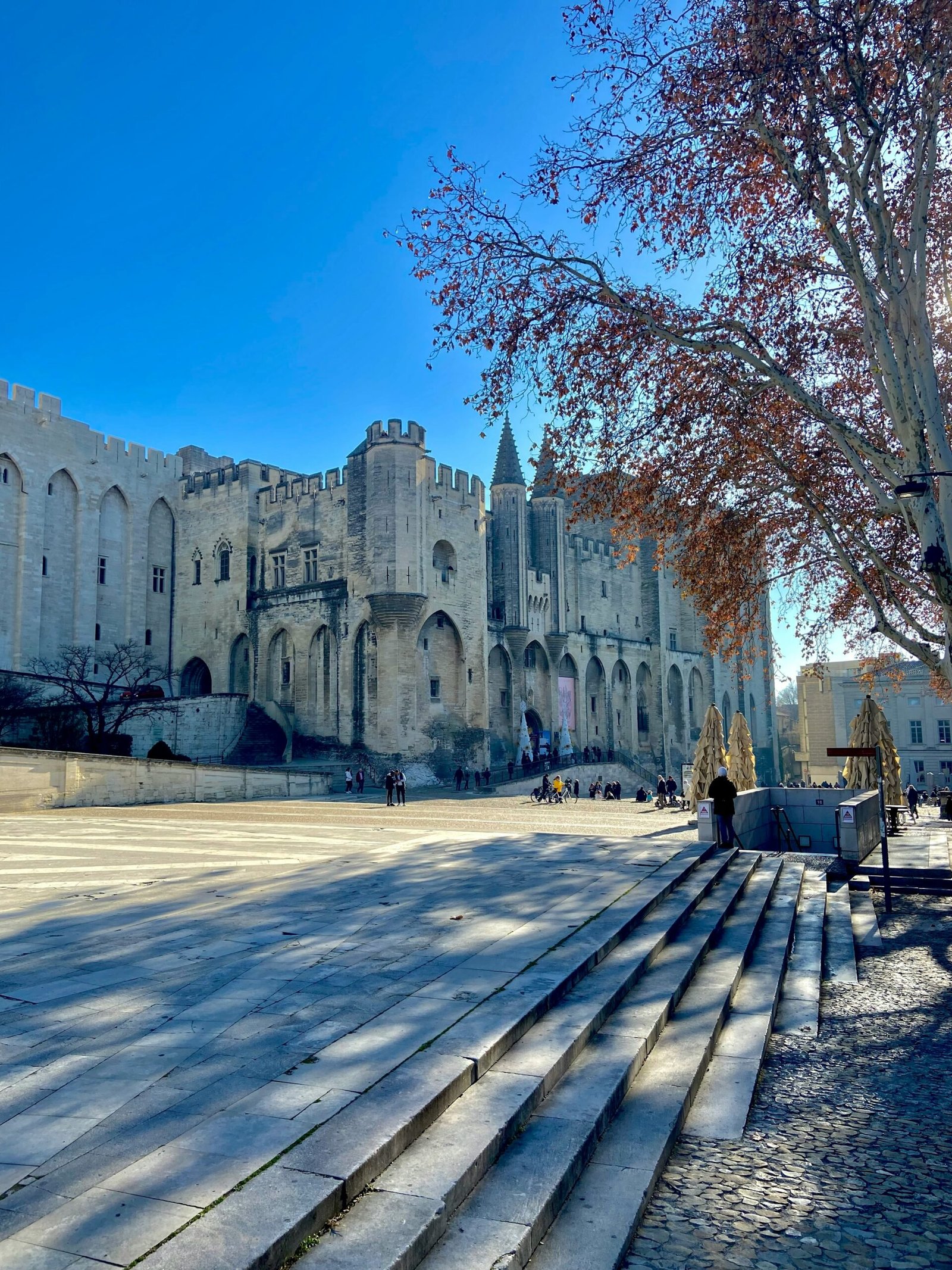 Historic palace in Avignon with a quiet winter atmosphere, offering a grounding and reflective setting for a France yoga retreat.
