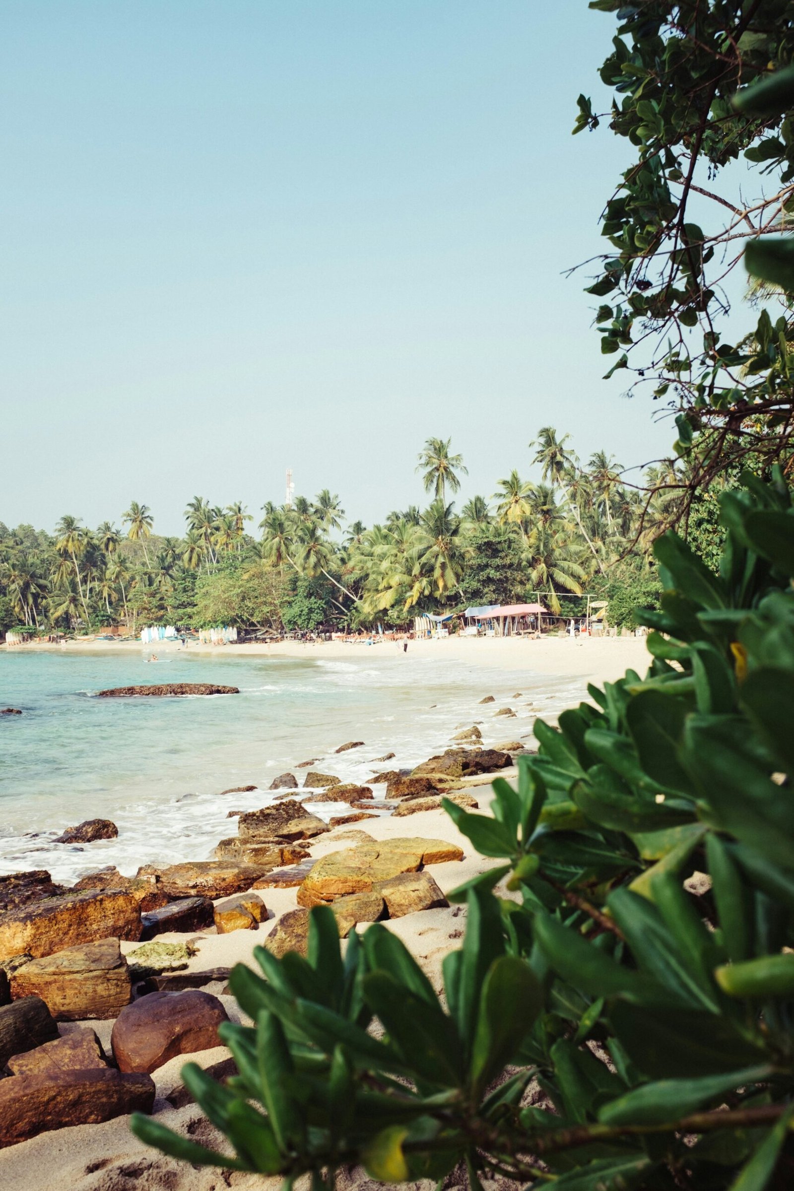 Calm shoreline and open water creating a soothing retreat backdrop for stillness, balance, and renewal