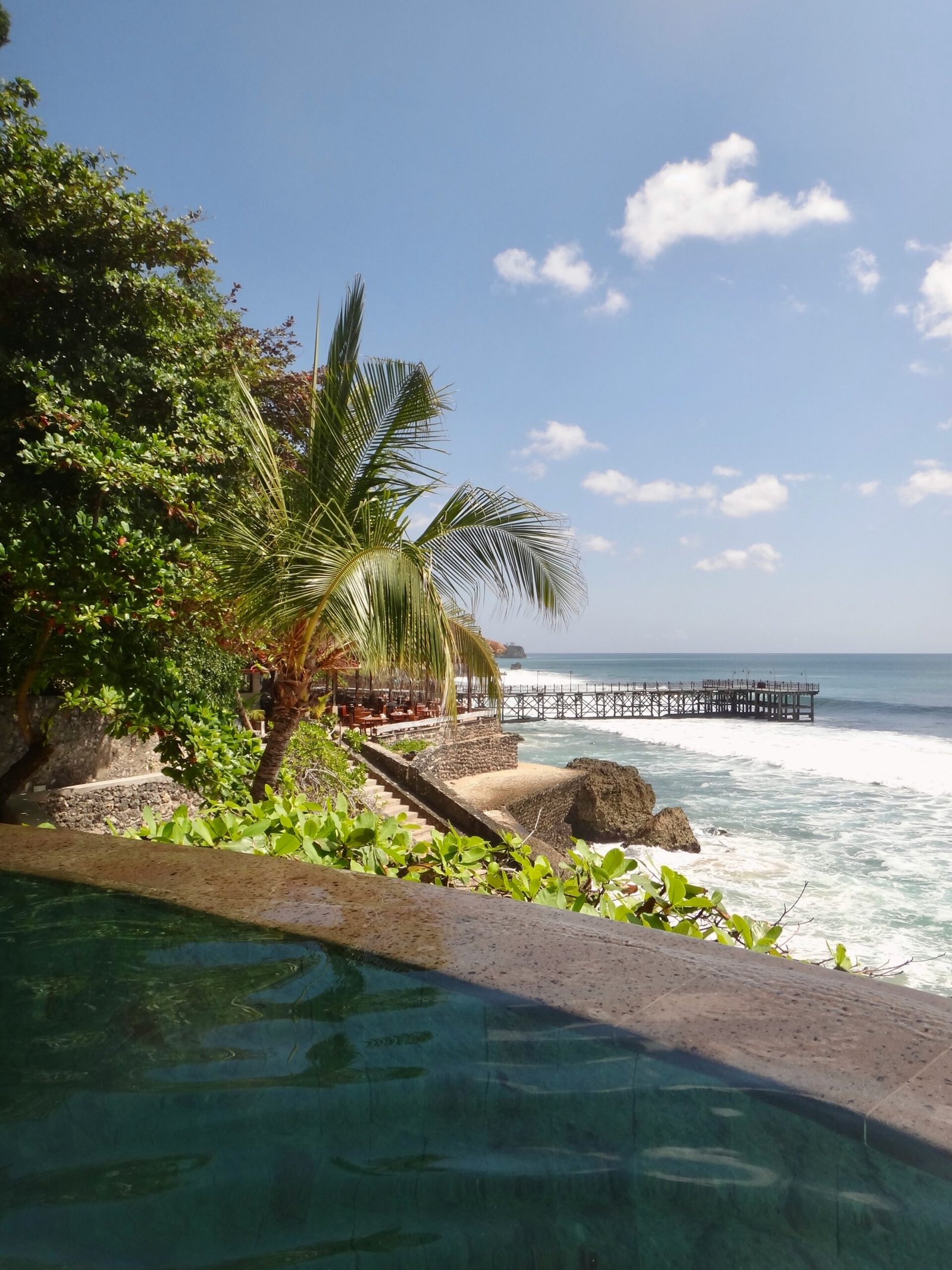 Oceanfront hot tub beside the beach creating a relaxing retreat setting for rest, renewal, and sea-view calm
