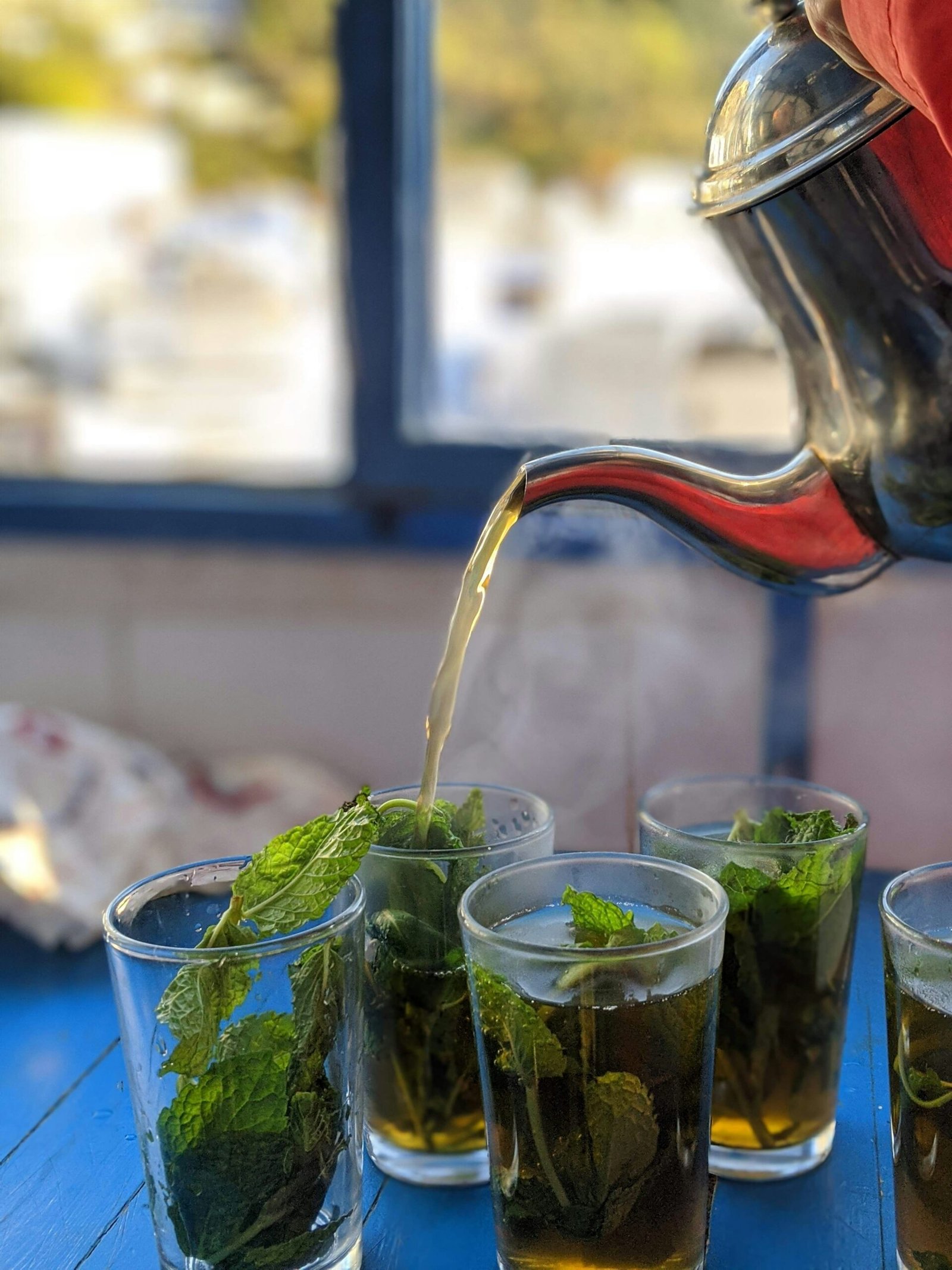 moroccan mint tea in chefchaouen during a quiet reflective moment