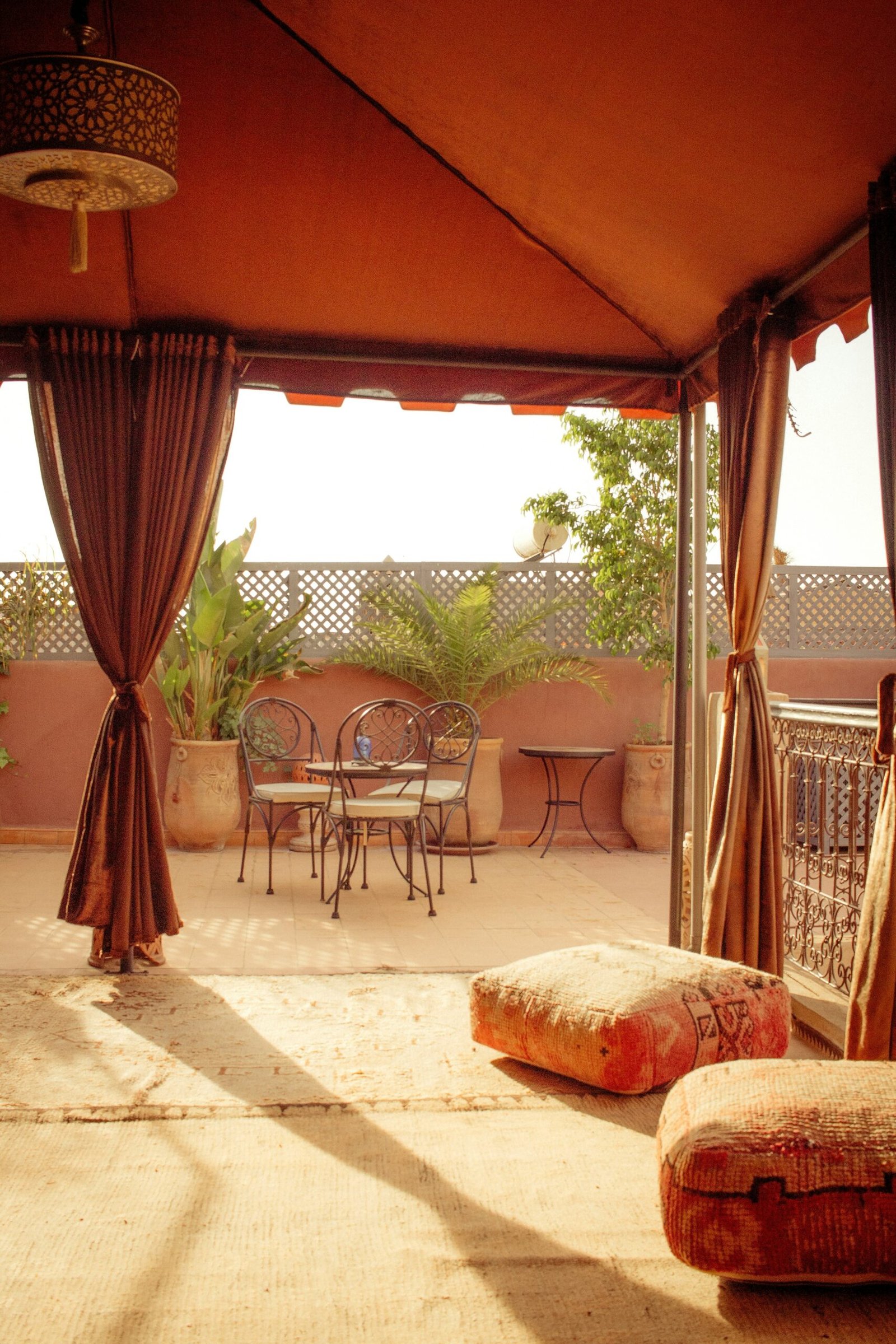 Covered outdoor patio with seating for quiet meals, journaling, or relaxation during a restorative retrea