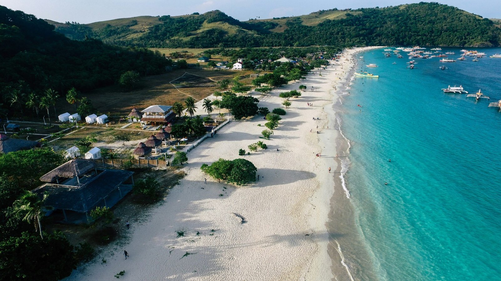 Aerial view of the Krabi coastline with clear water and a calm seasonal escape feel