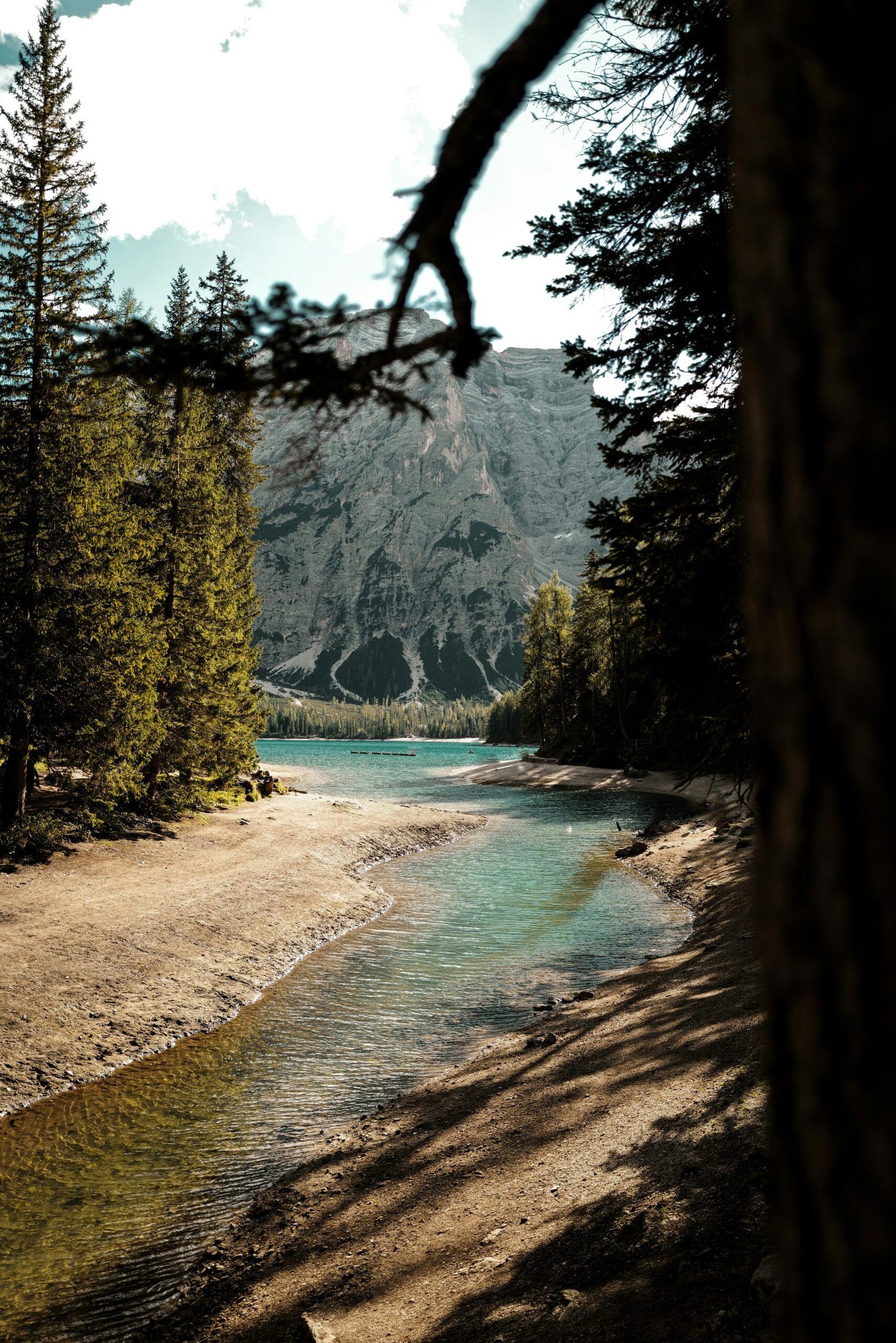 Gentle river flowing through a tree-lined landscape for a peaceful retreat atmosphere centered on reflection and reset