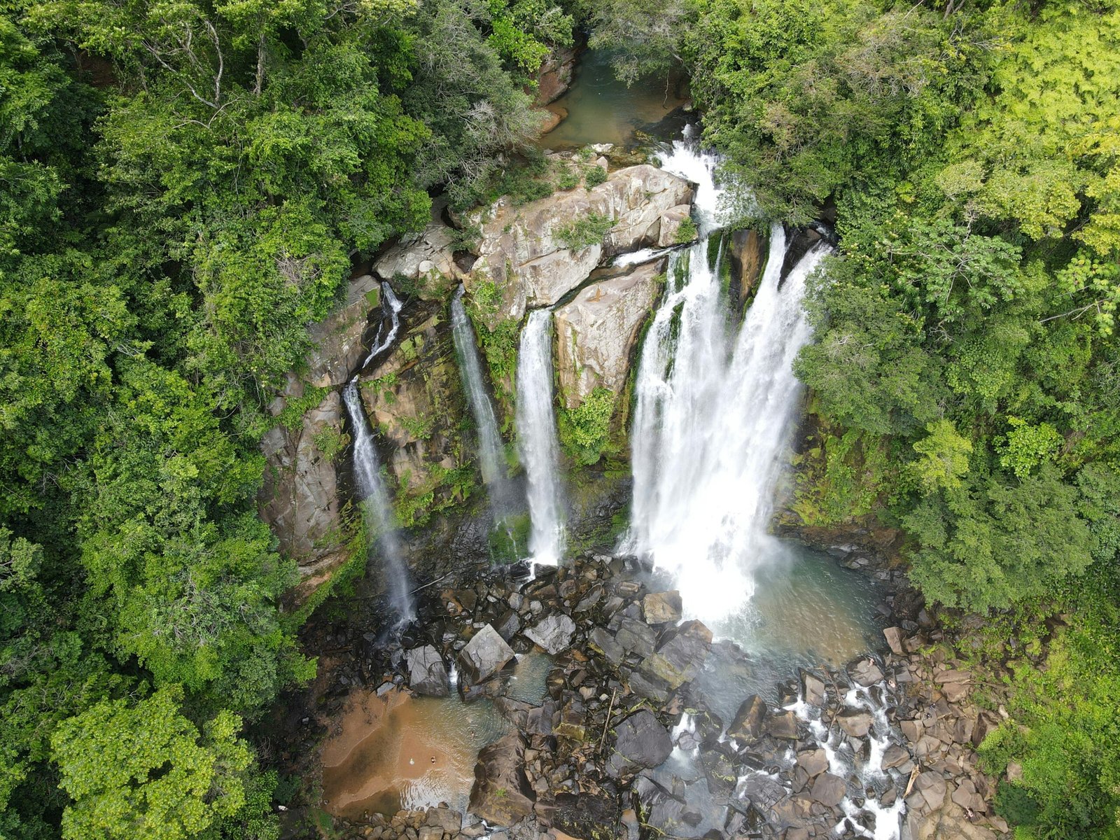 Aerial view of Upper Nauyaca Waterfalls cascading through jungle in Costa Rica