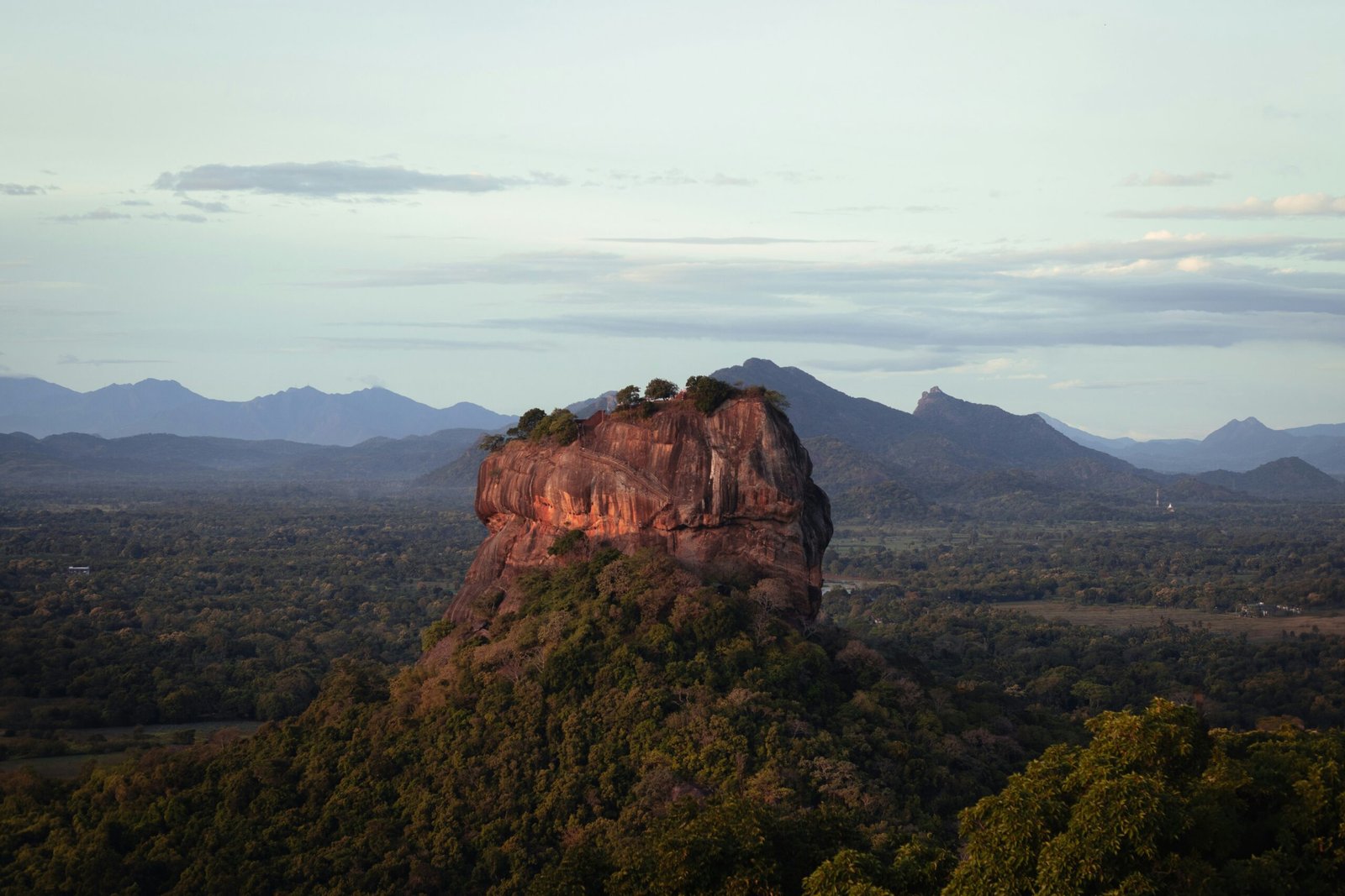 Sunrise view of Sigiriya Rock in Sri Lanka, adding a sense of perspective and transformation to a yoga retreat itinerary.