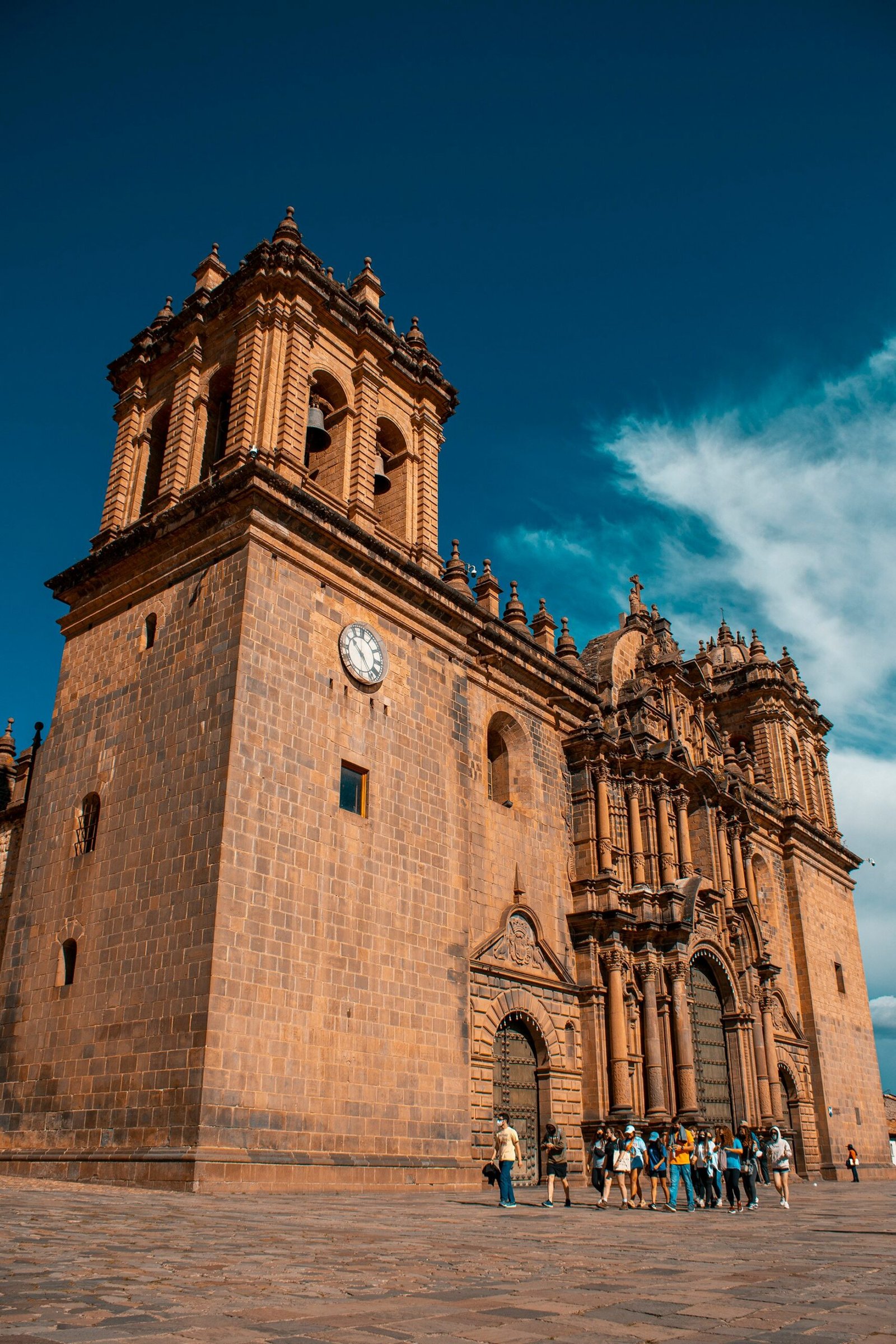 Historic building in Oaxaca de Juárez, Mexico, with cactus in the foreground