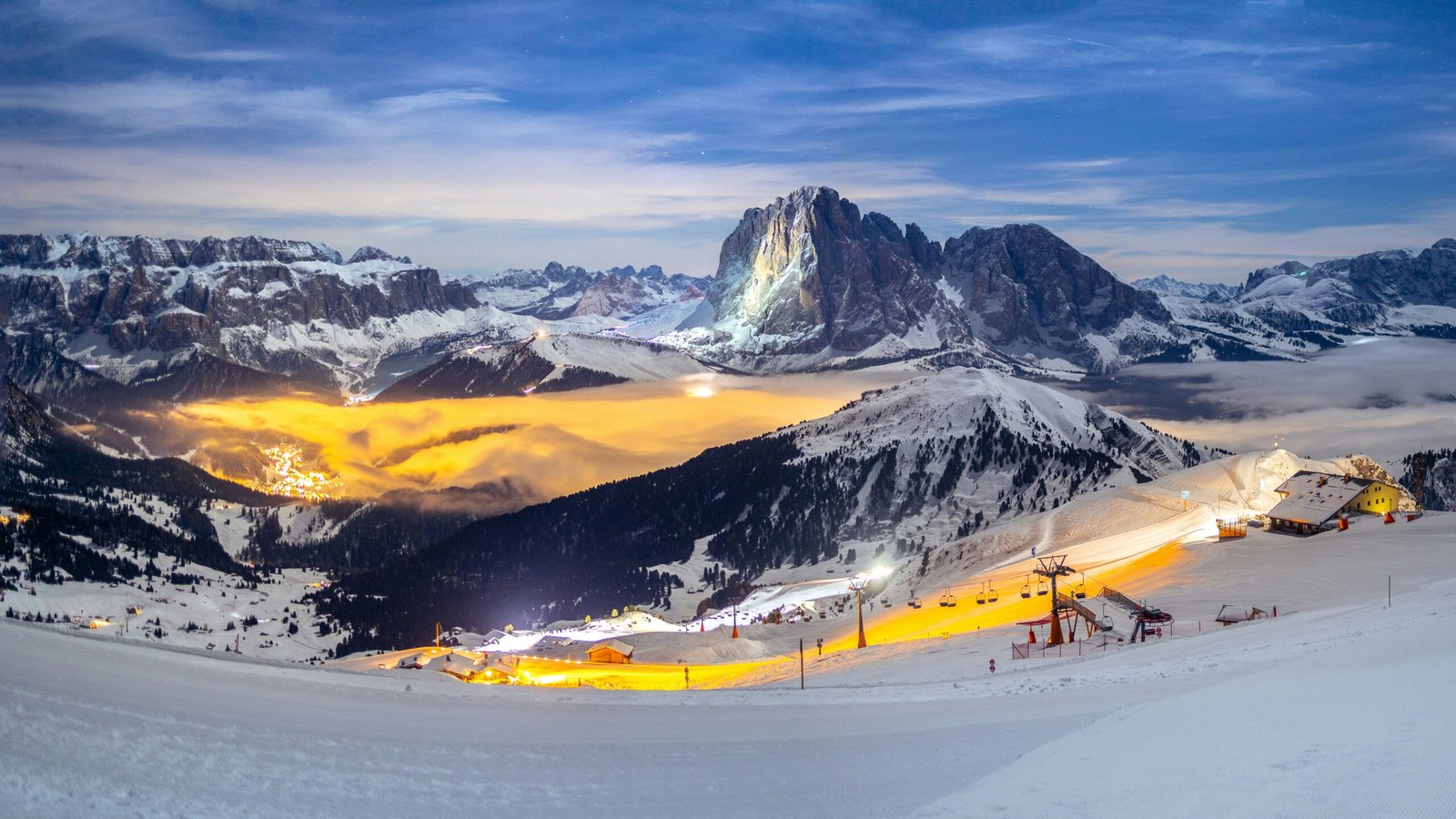 Snow-covered Dolomites above Sëlva in South Tyrol with a crisp high-altitude winter atmosphere.