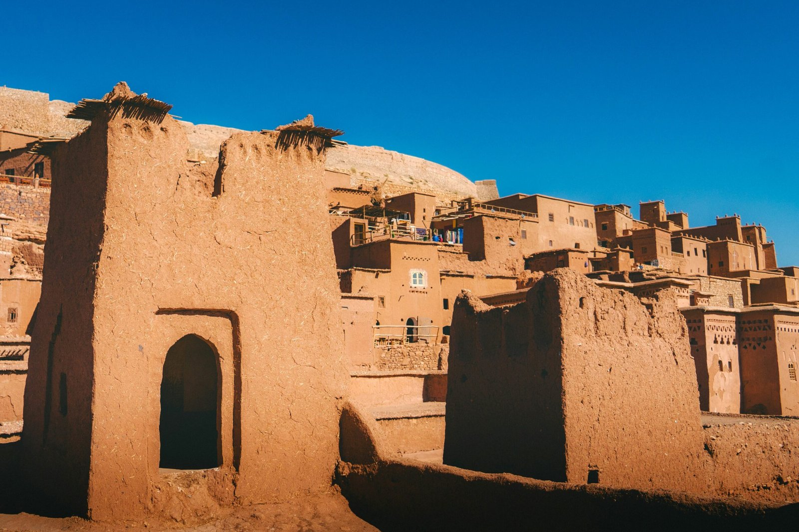 atlas mountain village with terraced slopes and clear autumn air in morocco