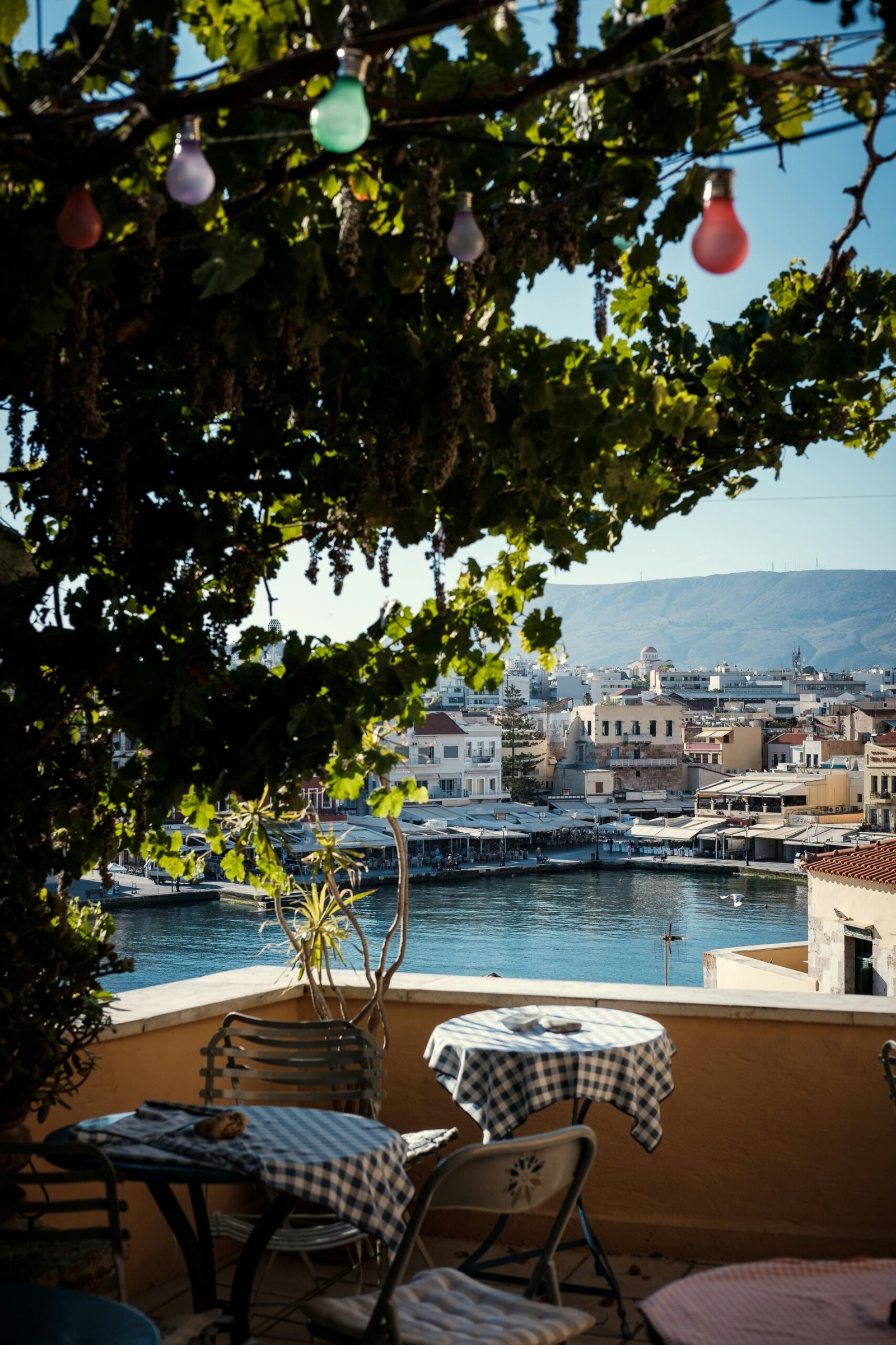 Black-and-white hotel table setting in Chania, Crete, adding a calm and welcoming detail to a Greece retreat stay.