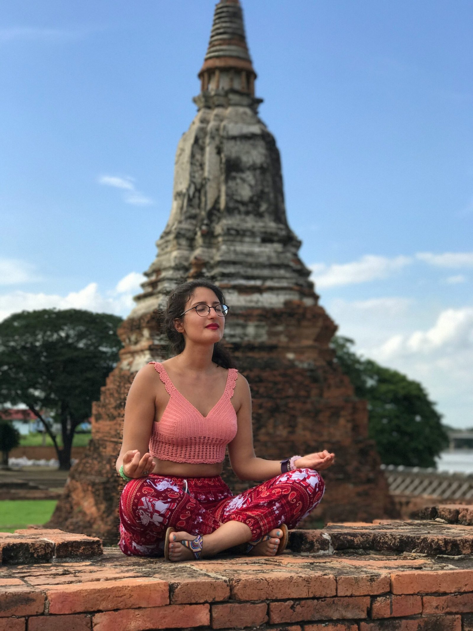 group yoga session in thailand with open movement and focused energy