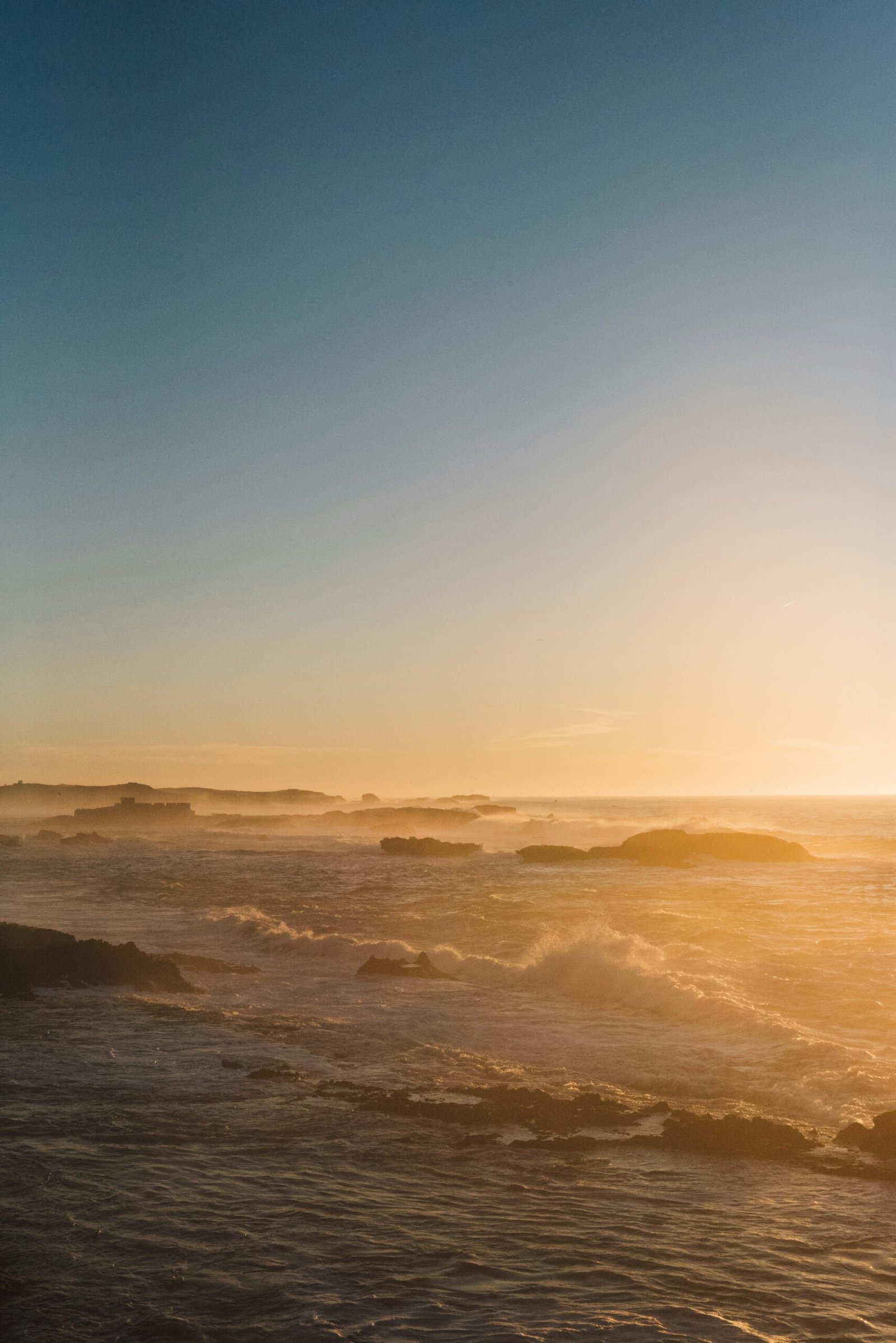 elevated view of taghazout bay with bright june sunlight and ocean breeze