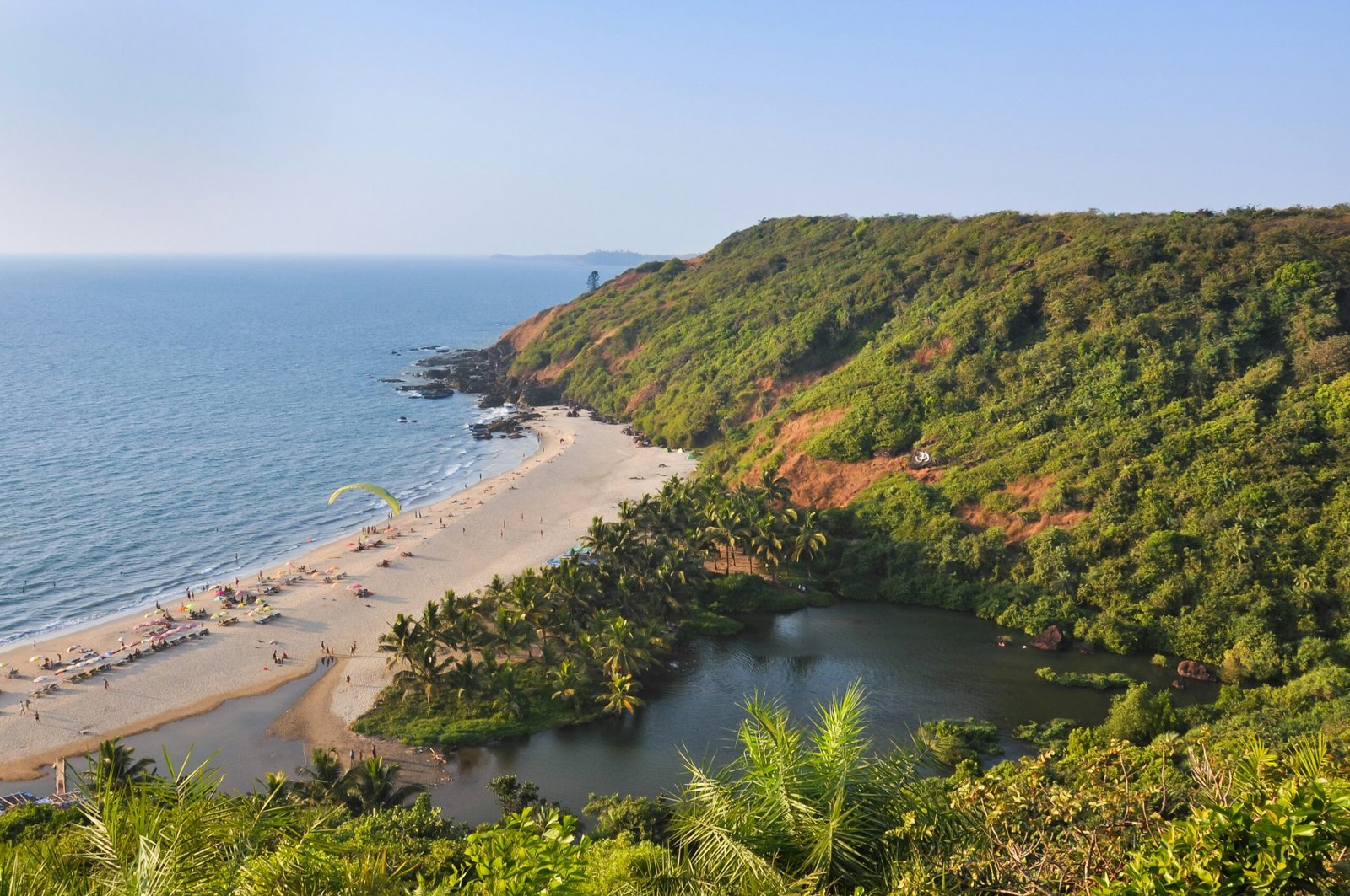 Elevated view of Arambol Beach in Goa, adding an open and refreshing coastal backdrop to a retreat-focused India article.