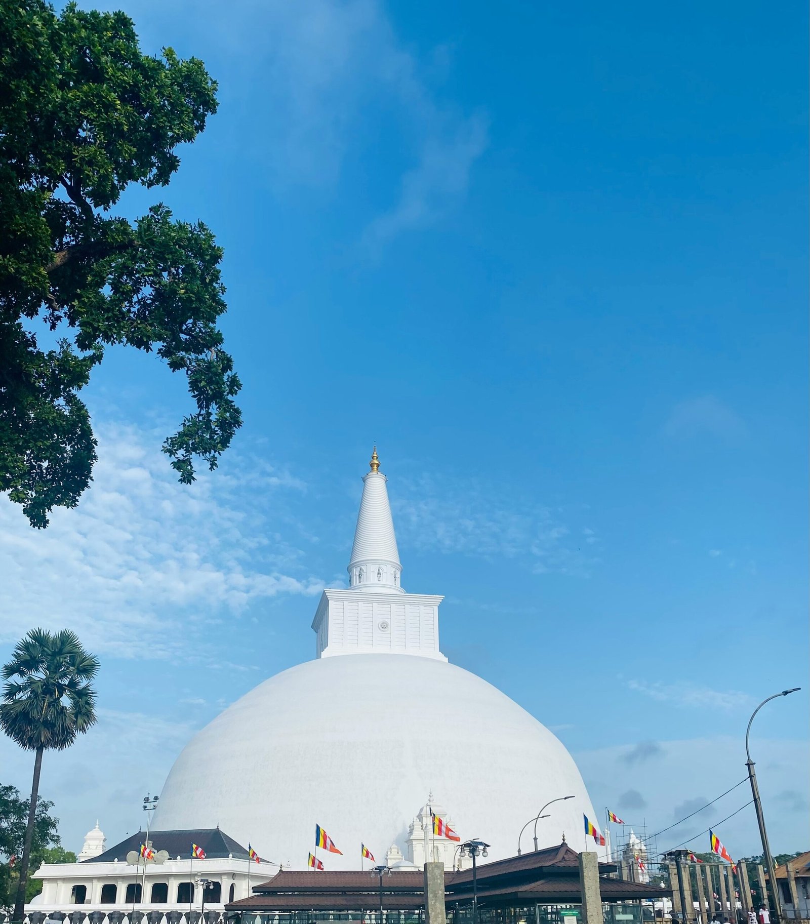 White stupa standing against the sky in the sacred city of Anuradhapura.