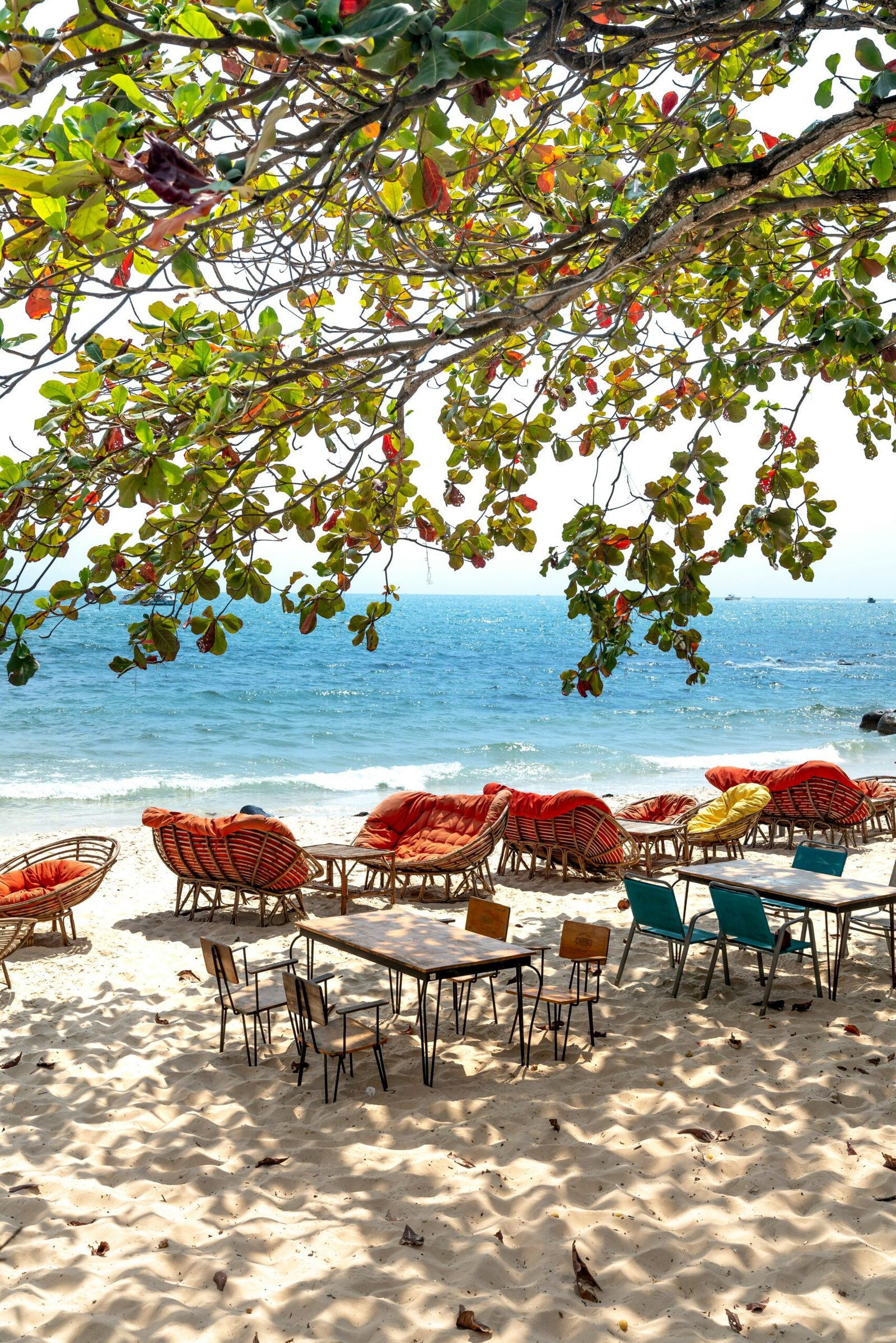 Rows of beach chairs on soft sand for a laid-back retreat atmosphere centered on rest and gentle recovery