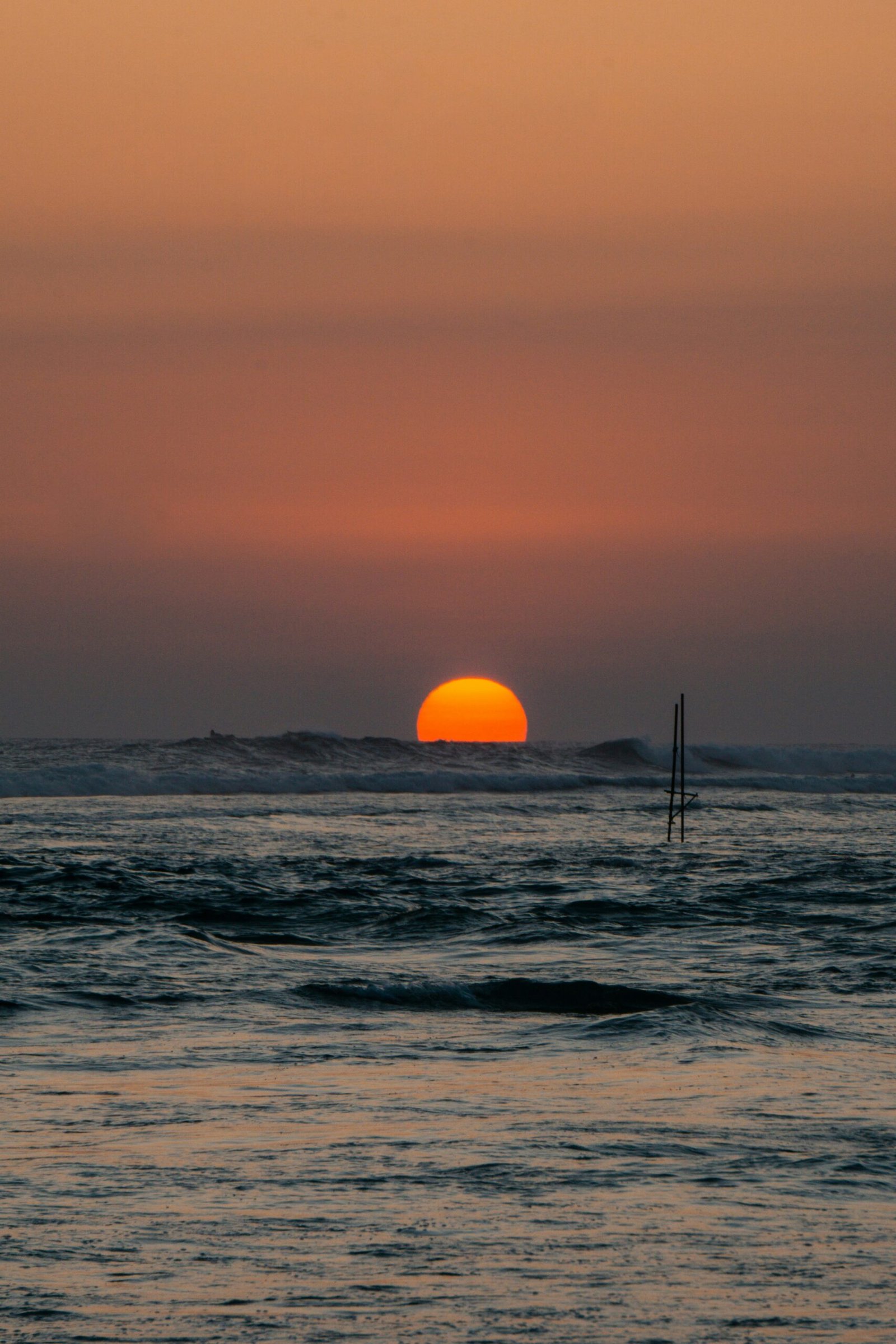 Sunset waves along the coast of Ahangama creating a calm setting for a March ayurveda retreat in Sri Lanka.