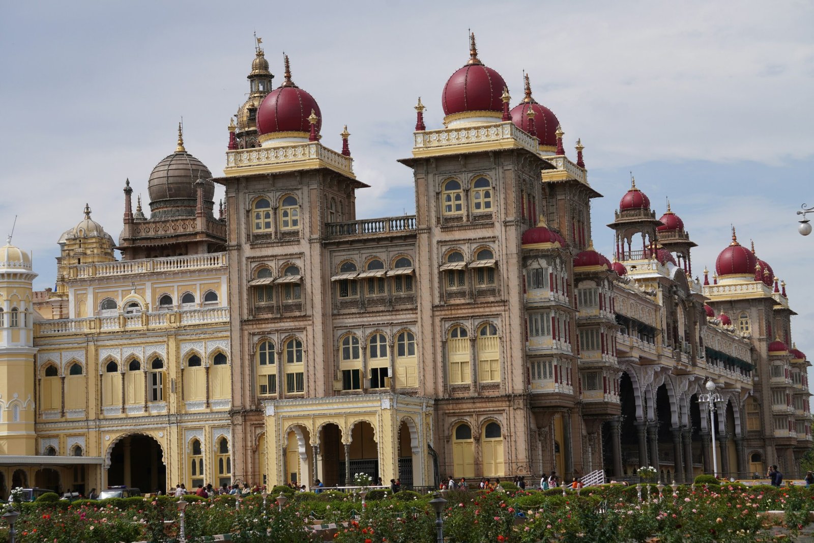 Mysore Palace rising under a clear sky, reflecting the cultural depth and traditional practice roots of a January retreat in India.