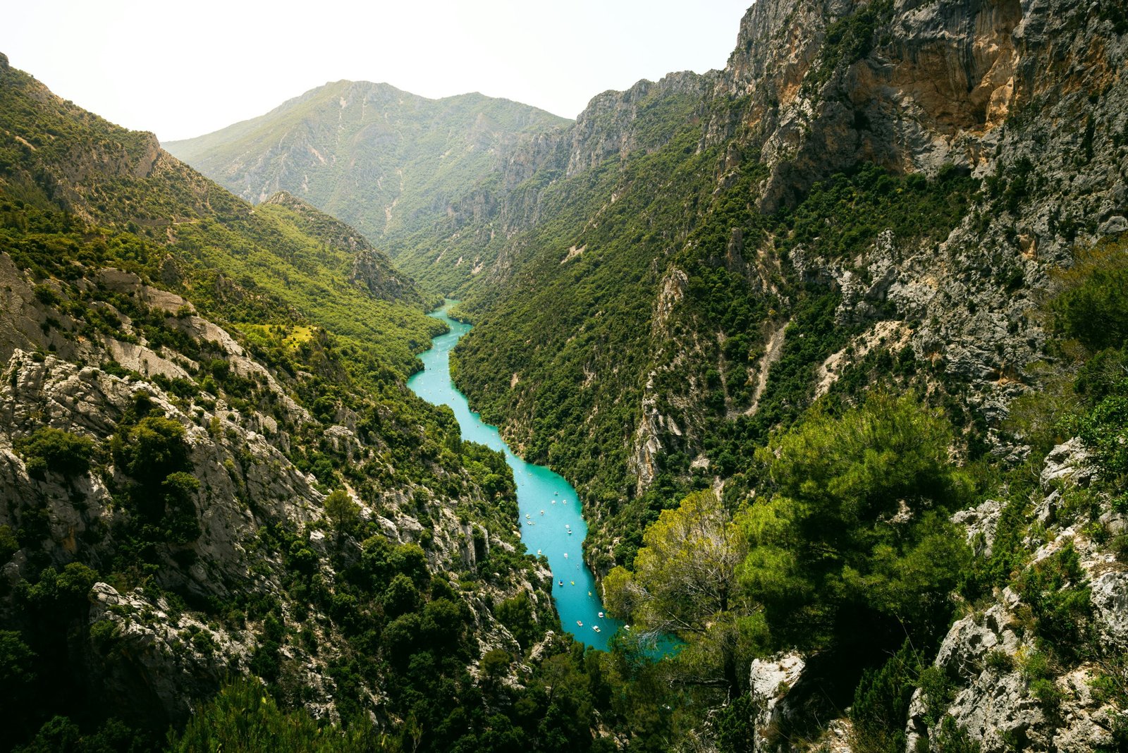Verdon River winding through mountain scenery, offering a fresh and inspiring natural setting for a summer yoga retreat in France.