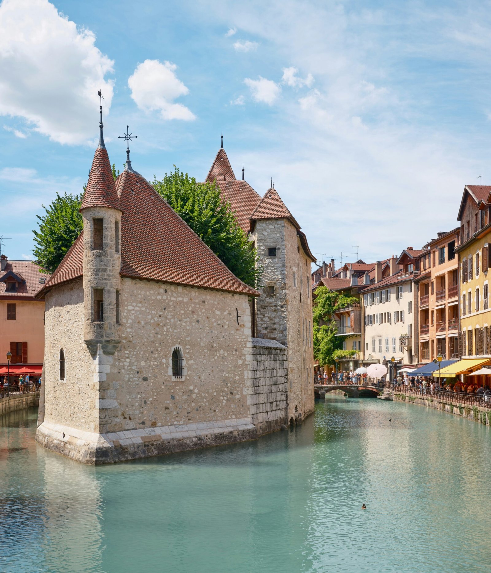 Waterside castle in Annecy, bringing a calm and scenic alpine atmosphere to a France yoga retreat.