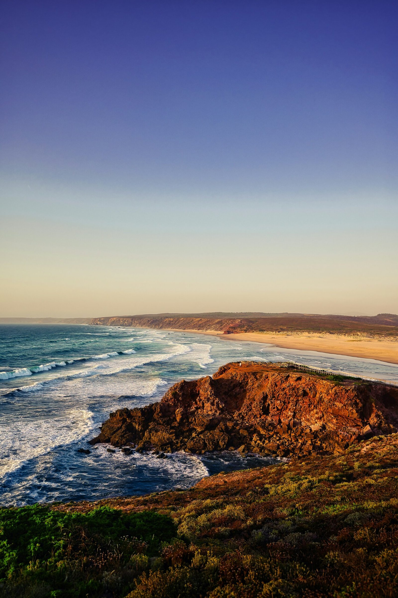 Bordeira's beach in portugal during a bright summer yoga retreat