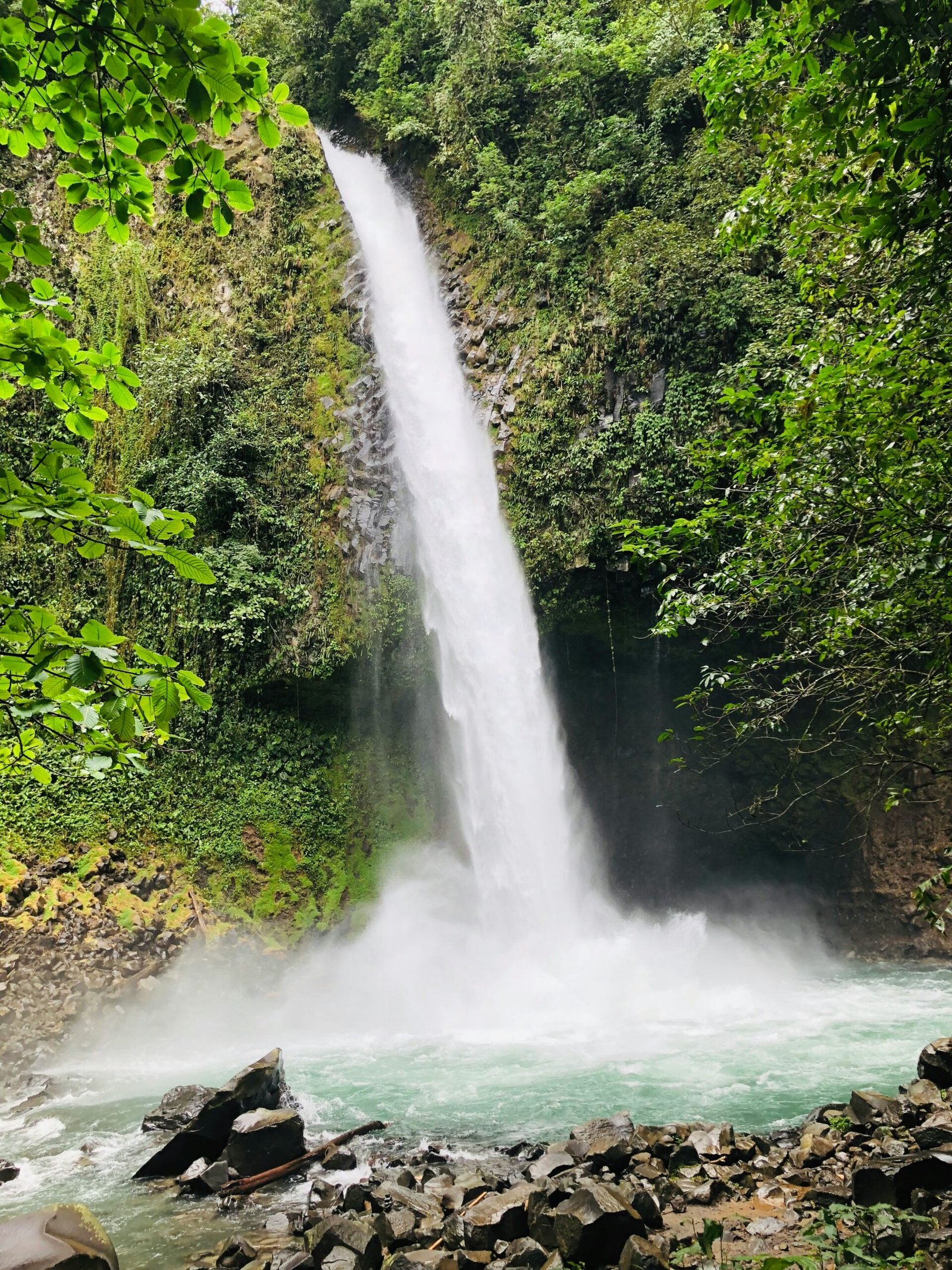 La Fortuna waterfall in Costa Rica reflecting the fresh, active atmosphere of a March cleansing retreat.