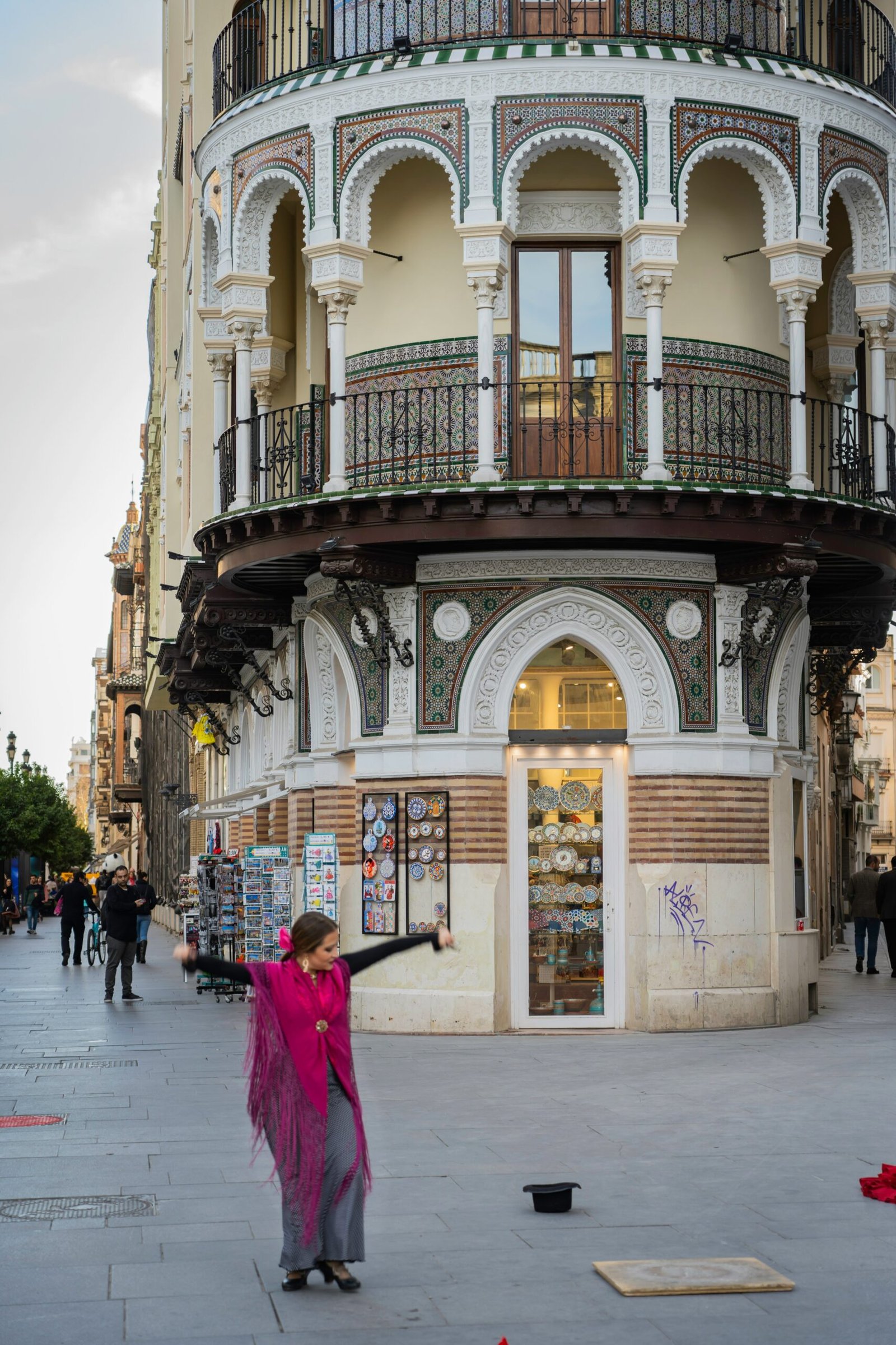 flamenco dancer performing in a street setting in seville spain