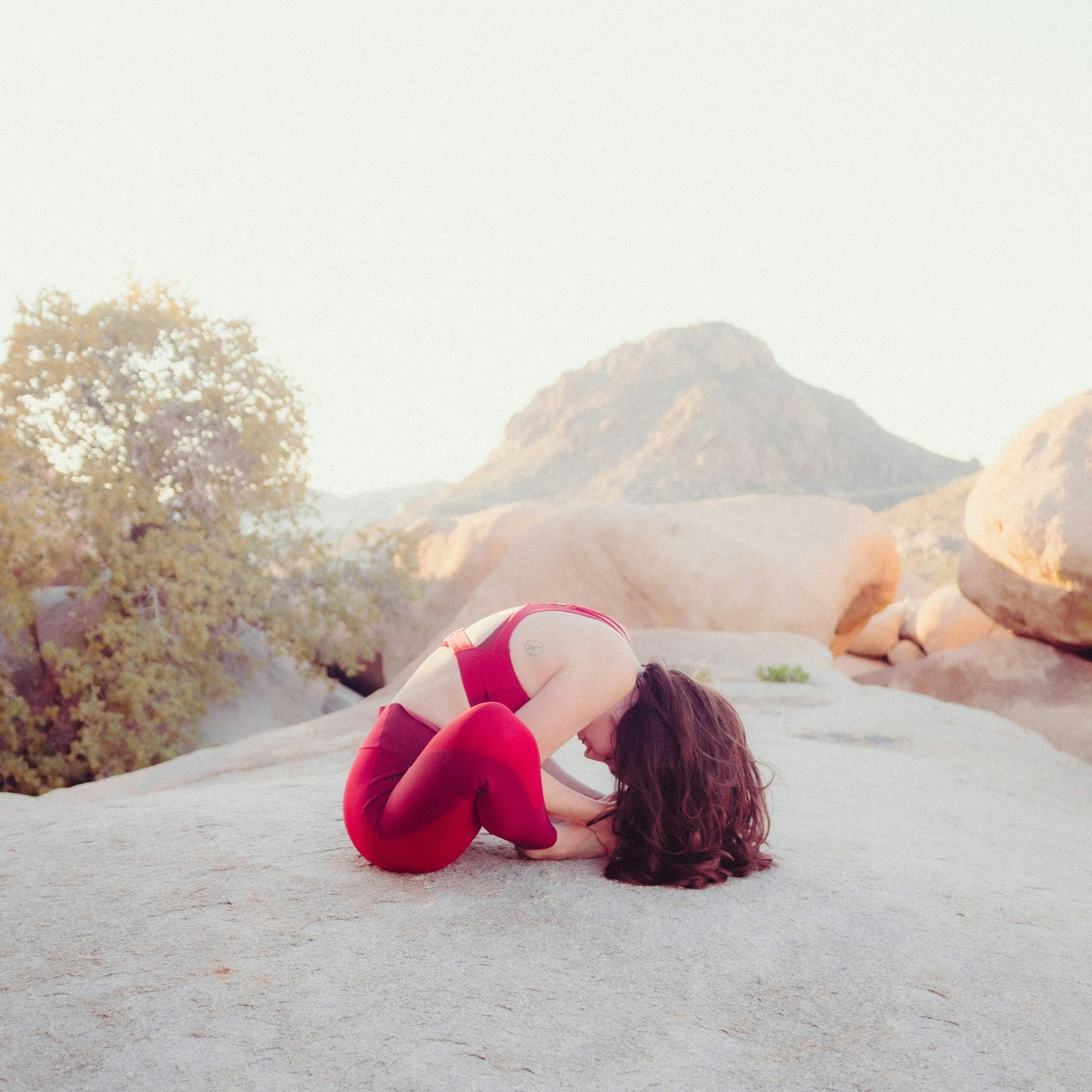 girls doing yoga in nature in october