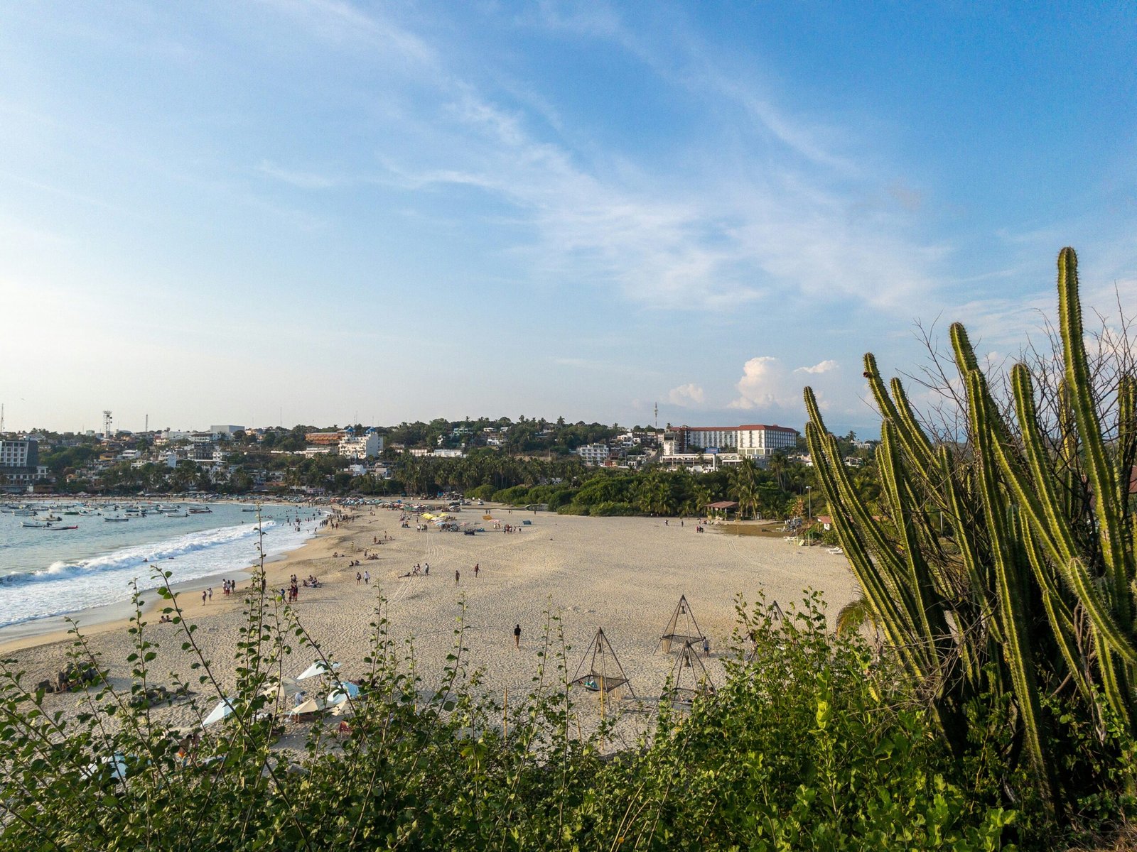 Beach scene in Puerto Escondido with a lively summer feel on Mexico’s Pacific coast